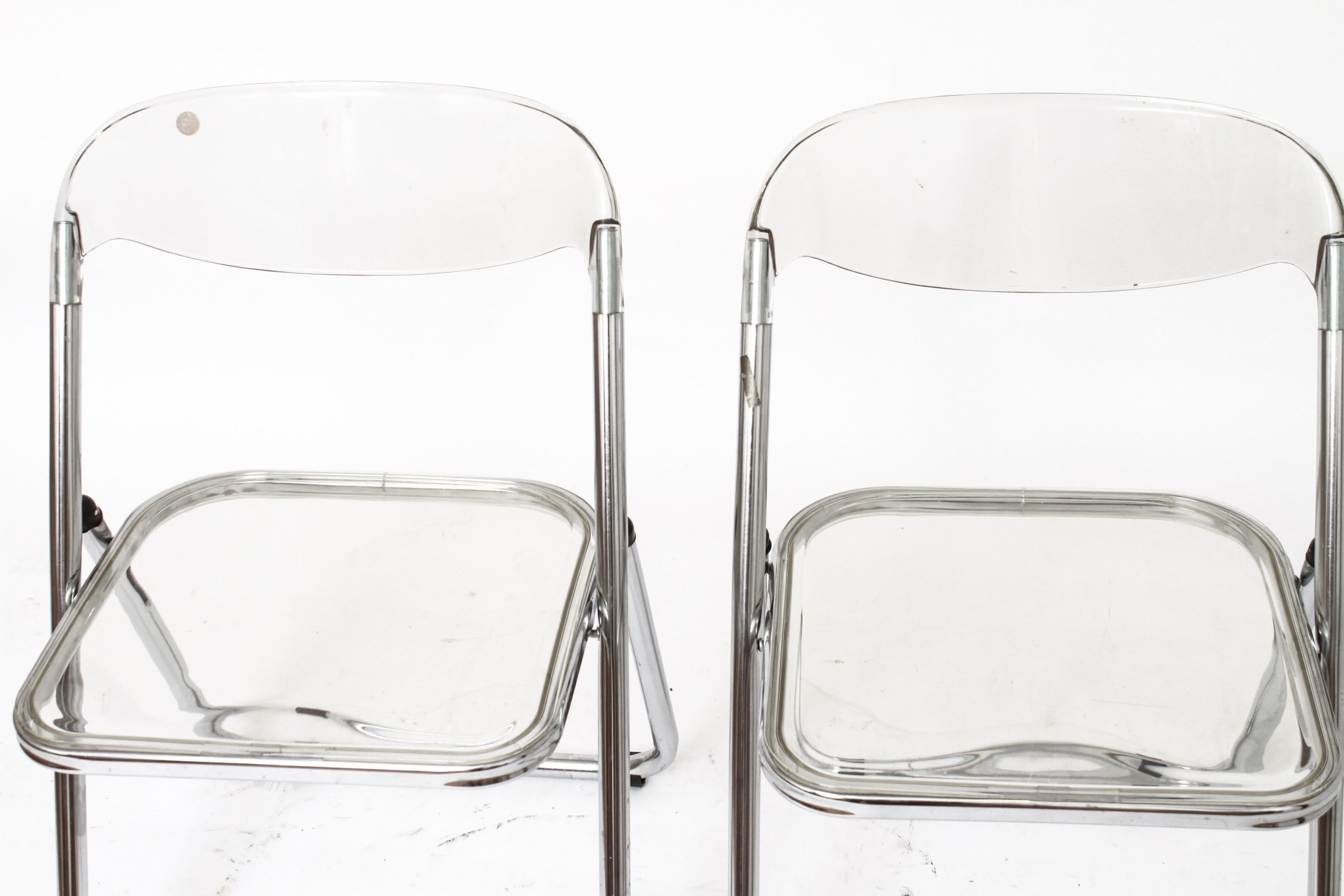 Giancarlo Piretti for Castelli pair of modern acrylic 'Plia' folding chairs. In great vintage condition with some light surface wear, one missing black bracket on front leg.