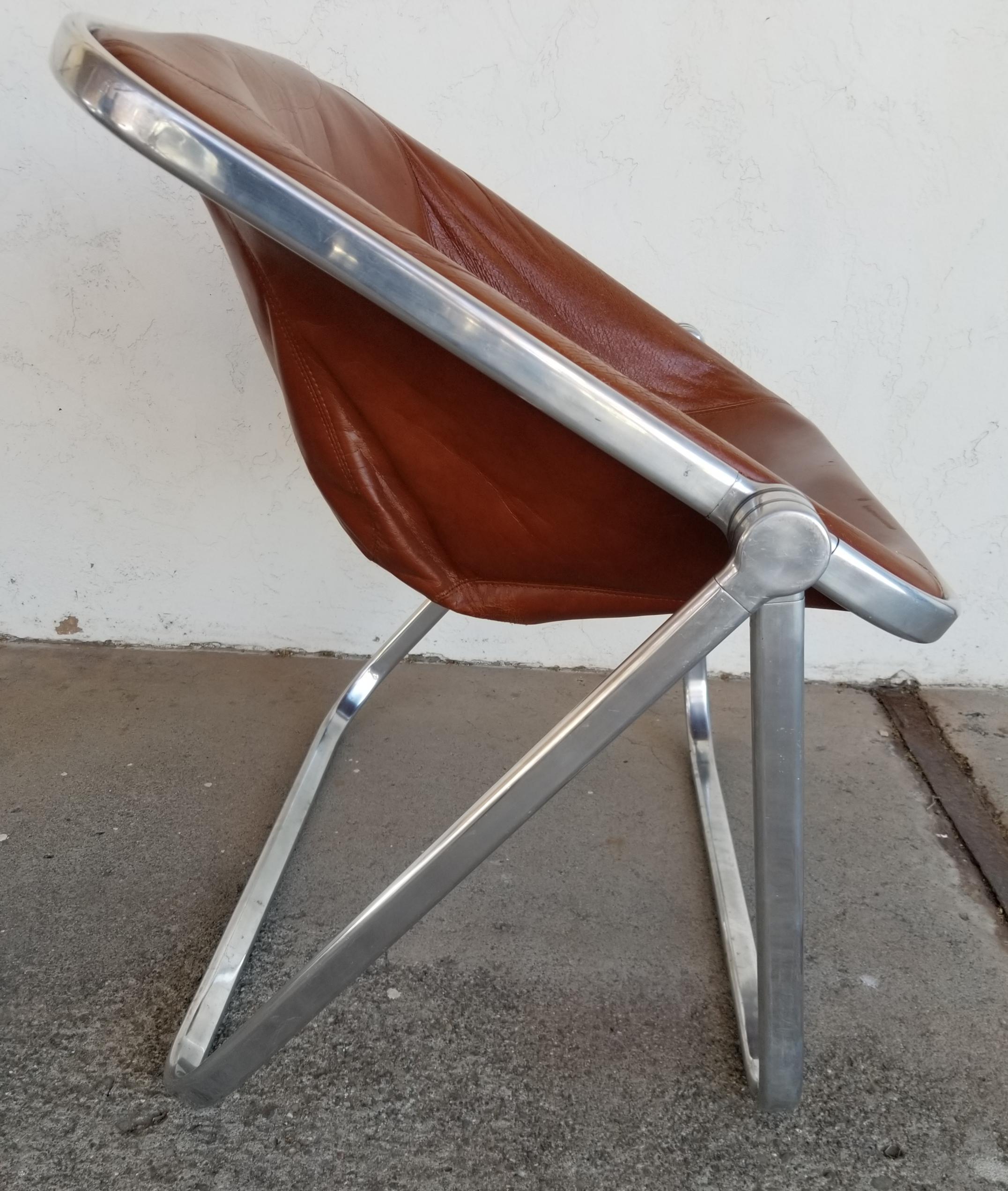 1970's chrome & leather folding chair designed by Giancarlo Piretti for Castelli. Made in Italy, circa. 1970's. Good original vintage condition with light age appropriate wear. Retains Castelli label.