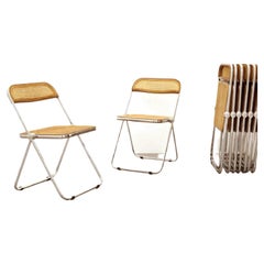 Giancarlo Piretti:: rare ensemble de dix chaises pliantes en bois et cannage "Plia"