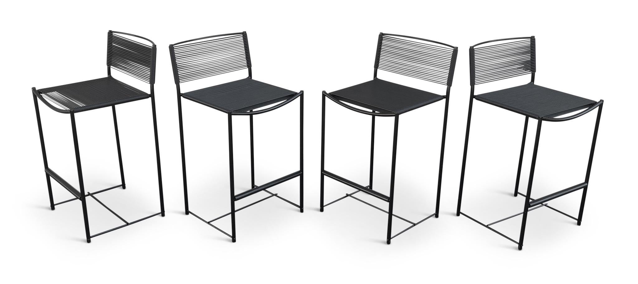 Designed by Giandomenico Belotti (1922-2004), these Spaghetti stools are quite comfortable with their PVC spaghetti straps on steel bases. A most successful design by Belotti, they are a part of the MoMA collection. This edition manufactured in