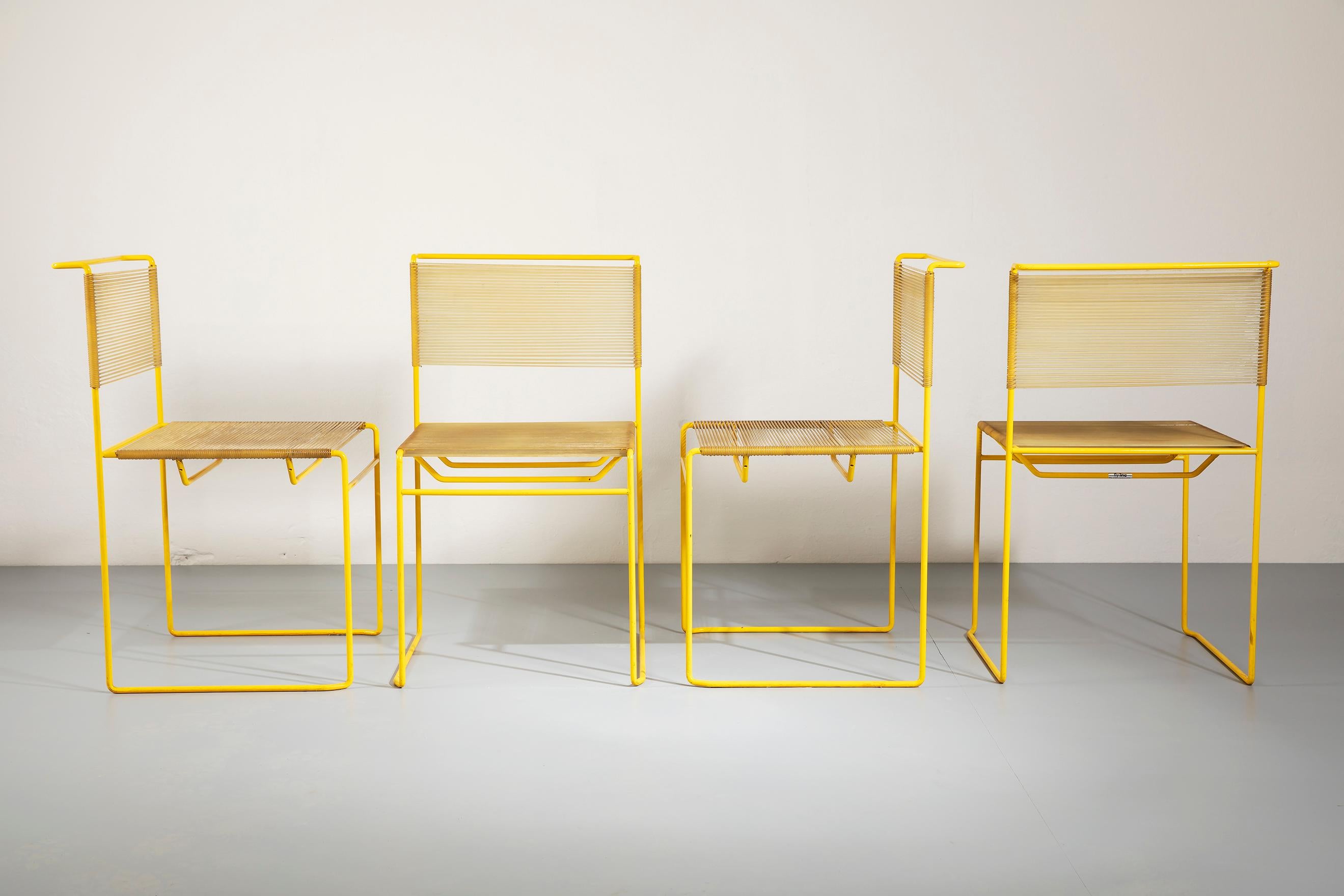 Set of four 'spaghetti' yellow lacquered steel chairs designed by Giandomenico Belotti for Fly Line in the 1970s.

Giandomenico Belotti
(1922-2004) after graduating in architecture from the University of Venice, he began working in research,