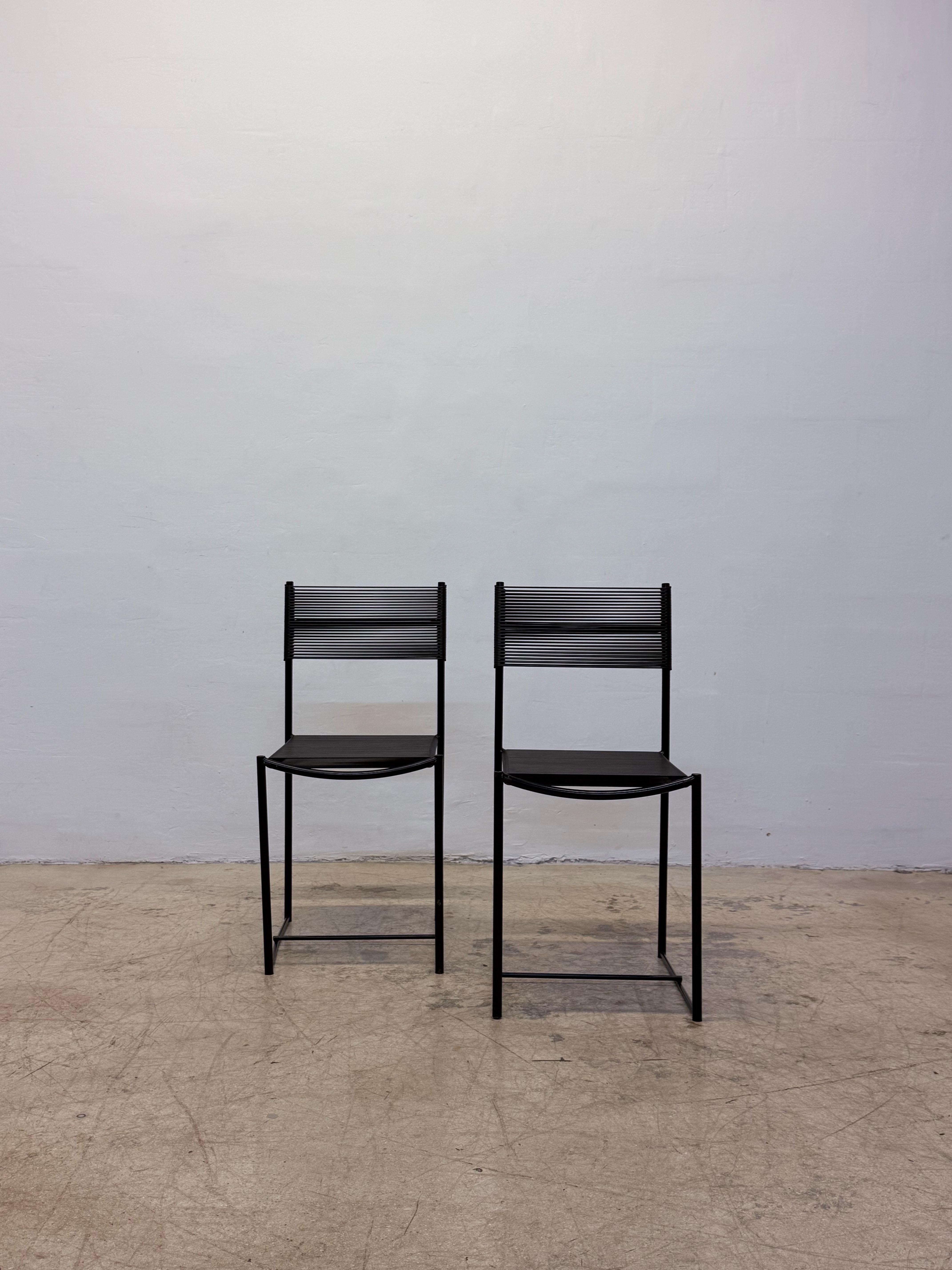Pair of black lacquered spaghetti chairs with plastic pvc tubing by Giandomenico Belotti for Alias.