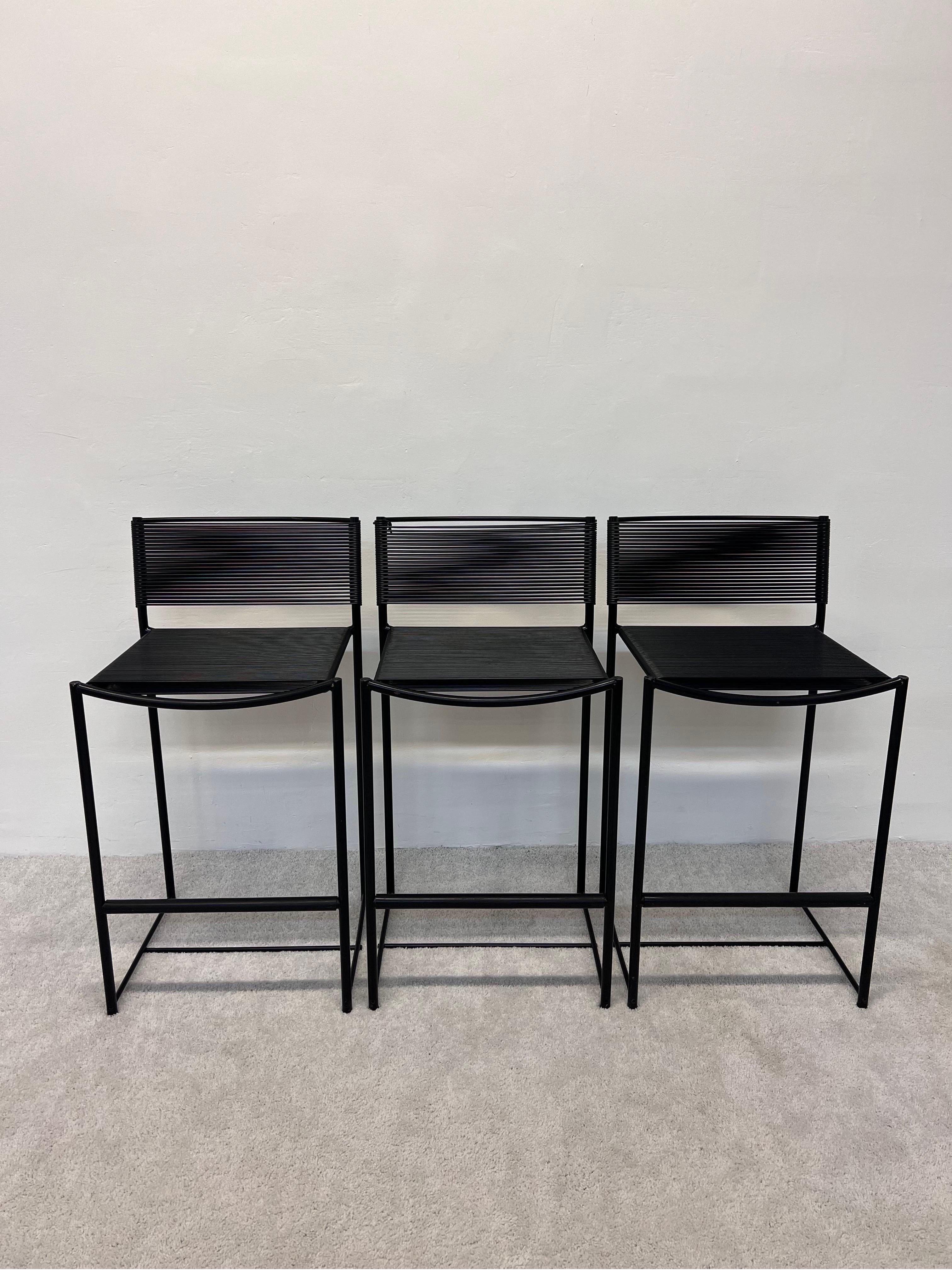Set of three black lacquered spaghetti bar stools with plastic pvc tubing by Giandomenico Belotti for Alias.