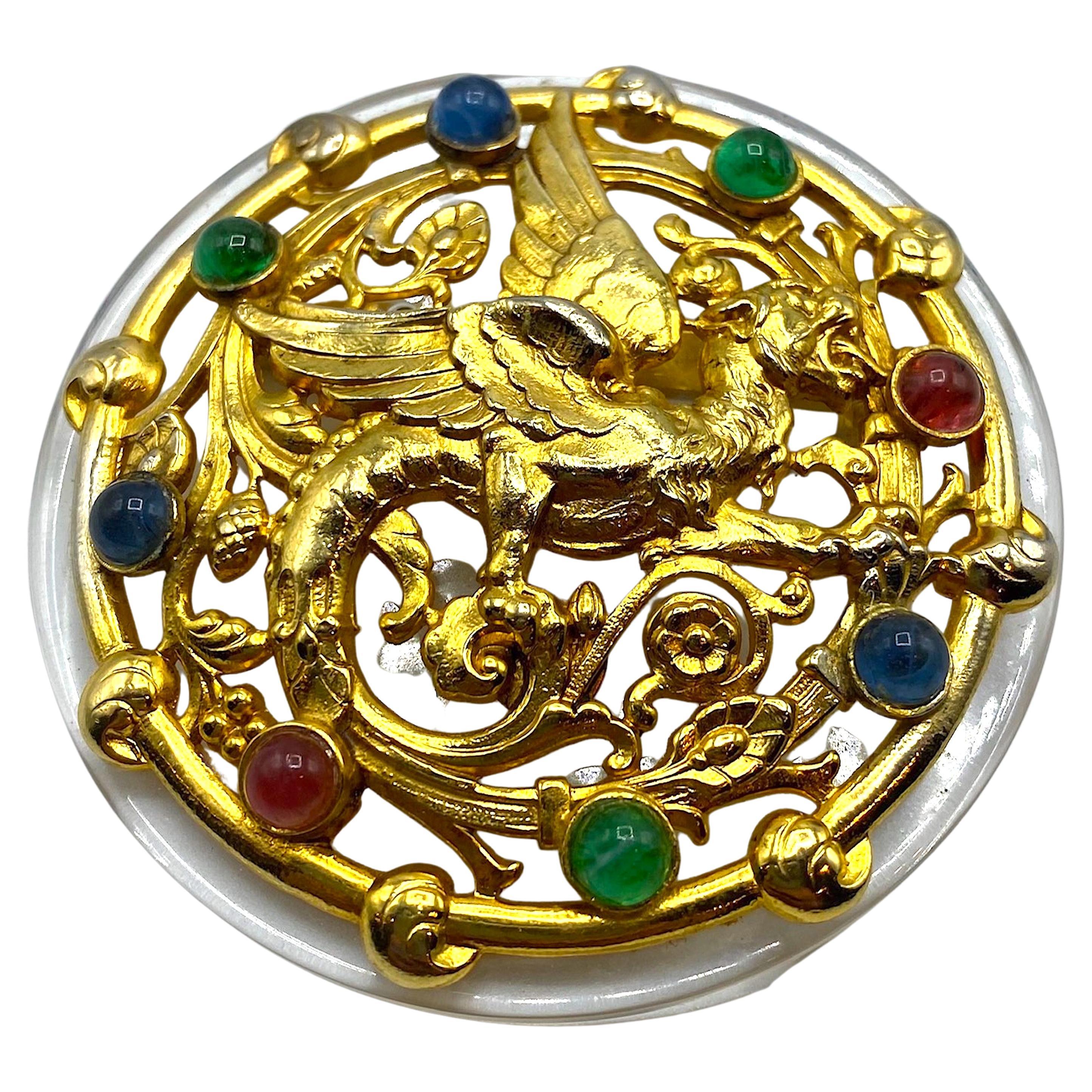 A spectacular rare and large brooch by famous Italian fashion designer Gianfranco Ferre form the 1980s. The craftsmanship is excellent in the depiction of the mythological creature of a wing lion with dragon or serpent tail known as a griffin. The