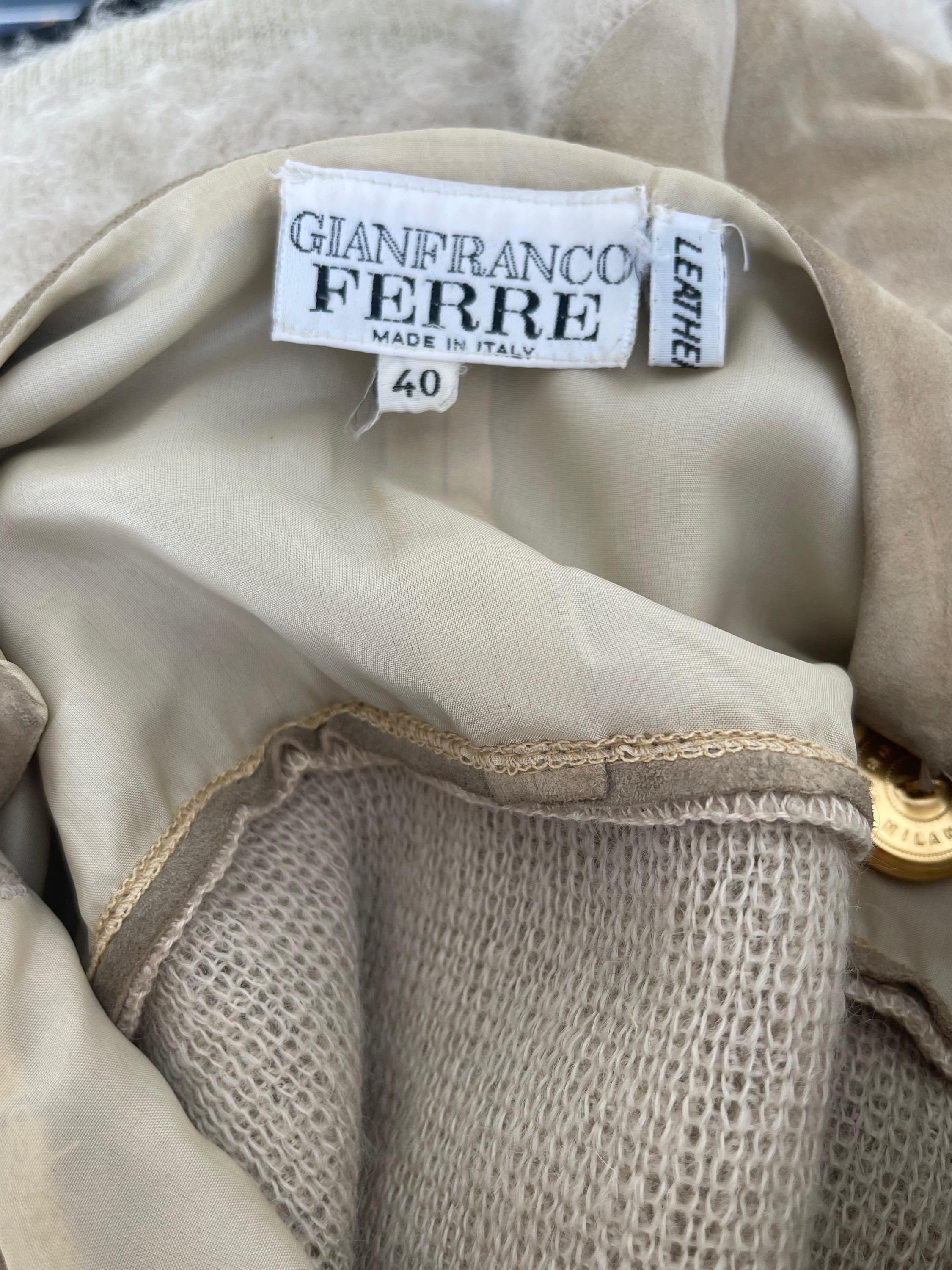 Chic early 90s GIANFRANCO FERRE tan / nude suede leather and mohair sweater top ! Features panels of suede and mohair, and is lined in silk behind the suede panels. Gold button at each side of the neck. Black ribbed cuff at each hand. 
In great
