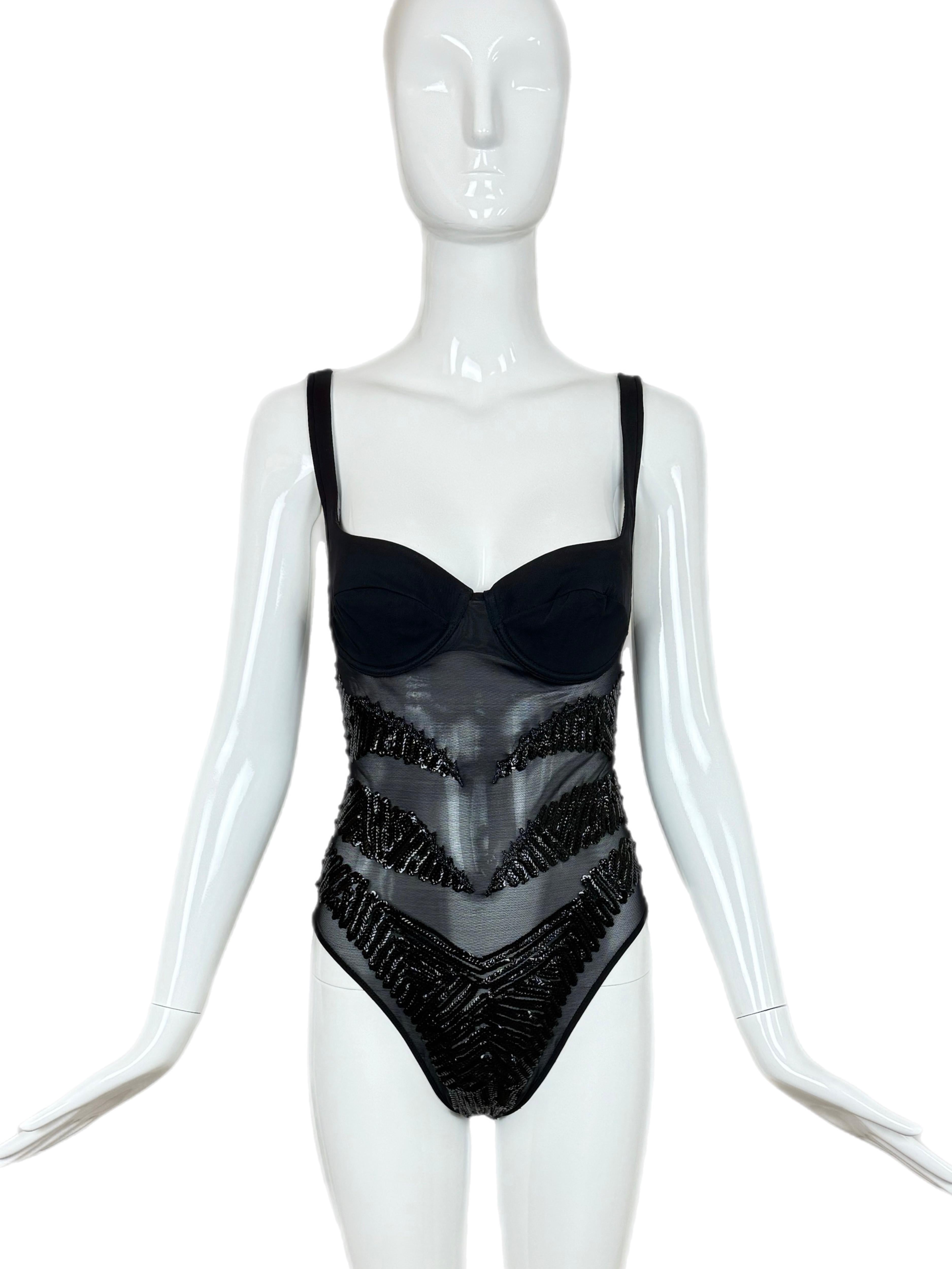 Gianfranco Ferre
1990's
Vintage
Body de malla negro azabache con lentejuelas negro azabache
Talla IT44, tiene sentido para el pecho, pero la medida de la cintura parece más pequeña
Consulta las medidas al final del anuncio
Excelente estado vintage.
