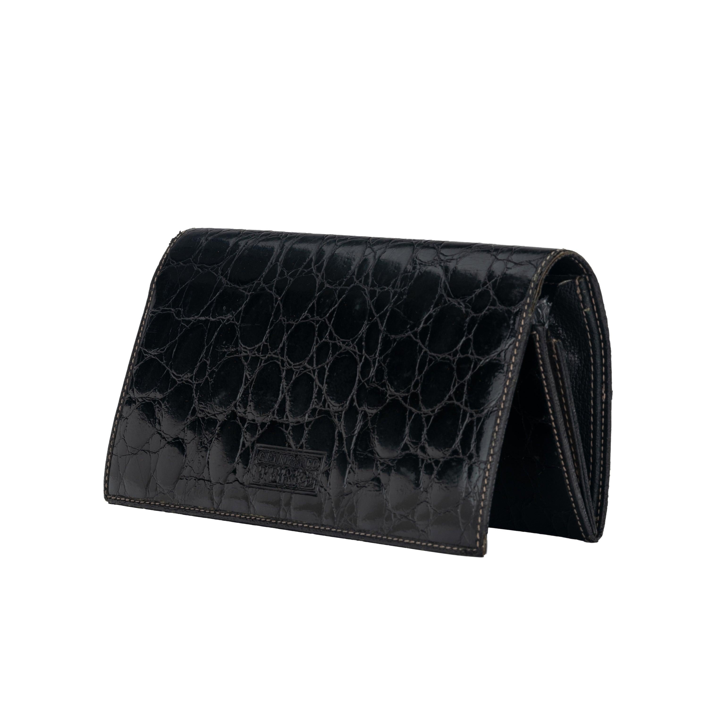 Gianfranco Ferré black crocodile leather wallet. Rectangular style.
 
 
 Height:11;Width:18;Depth:2