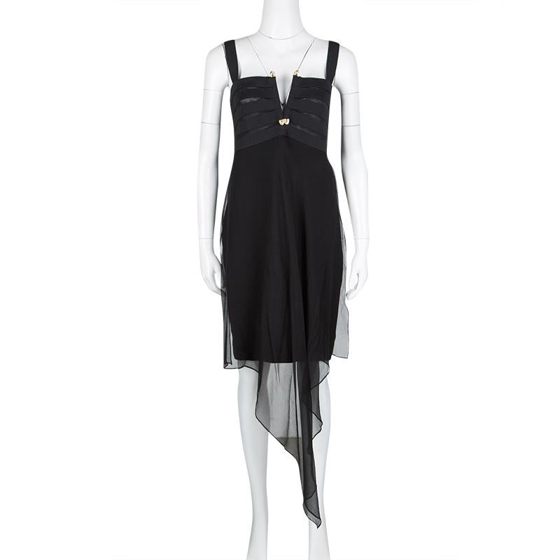 A perfect dress for those parties and events, this Gianfranco Ferre sleeveless dress is sure to create the most alluring looks to make you shine. Constructed in black silk fabric, this dress features an asymmetric draped design along the skirt and a