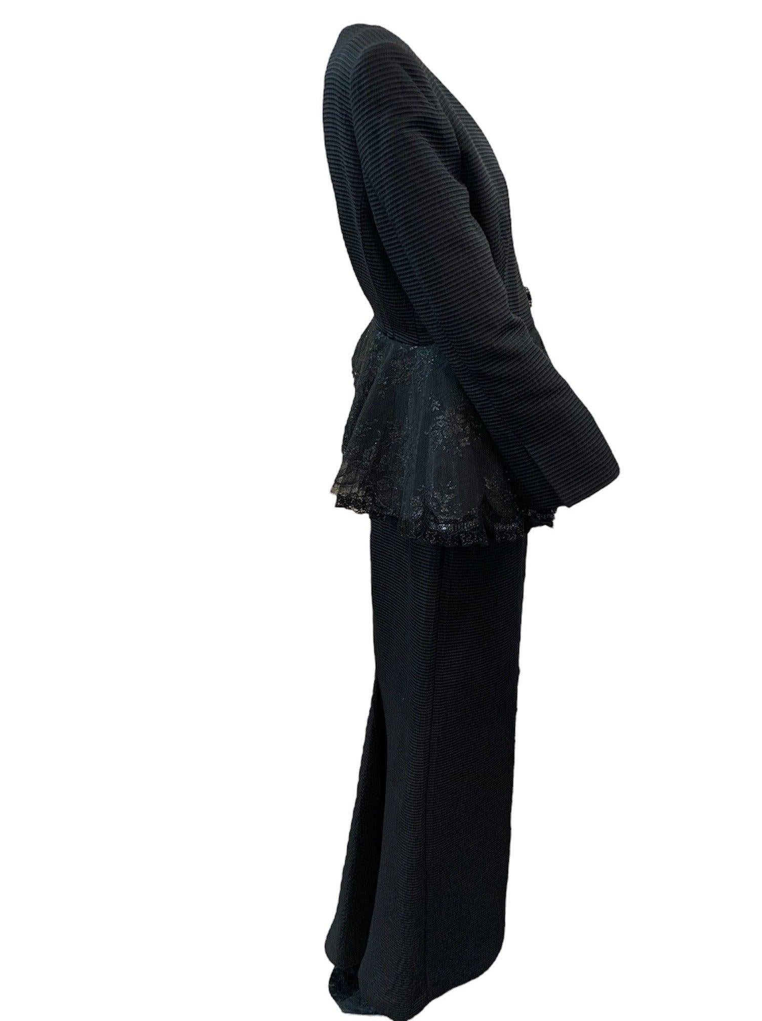 1980s era Gianfranco Ferre evening ensemble. Black faille jacket with heavy lace peplum with diamante button closing with hidden snaps. paired with full length slim fitting straight skirt.  High drama. Fully lined and in excellent