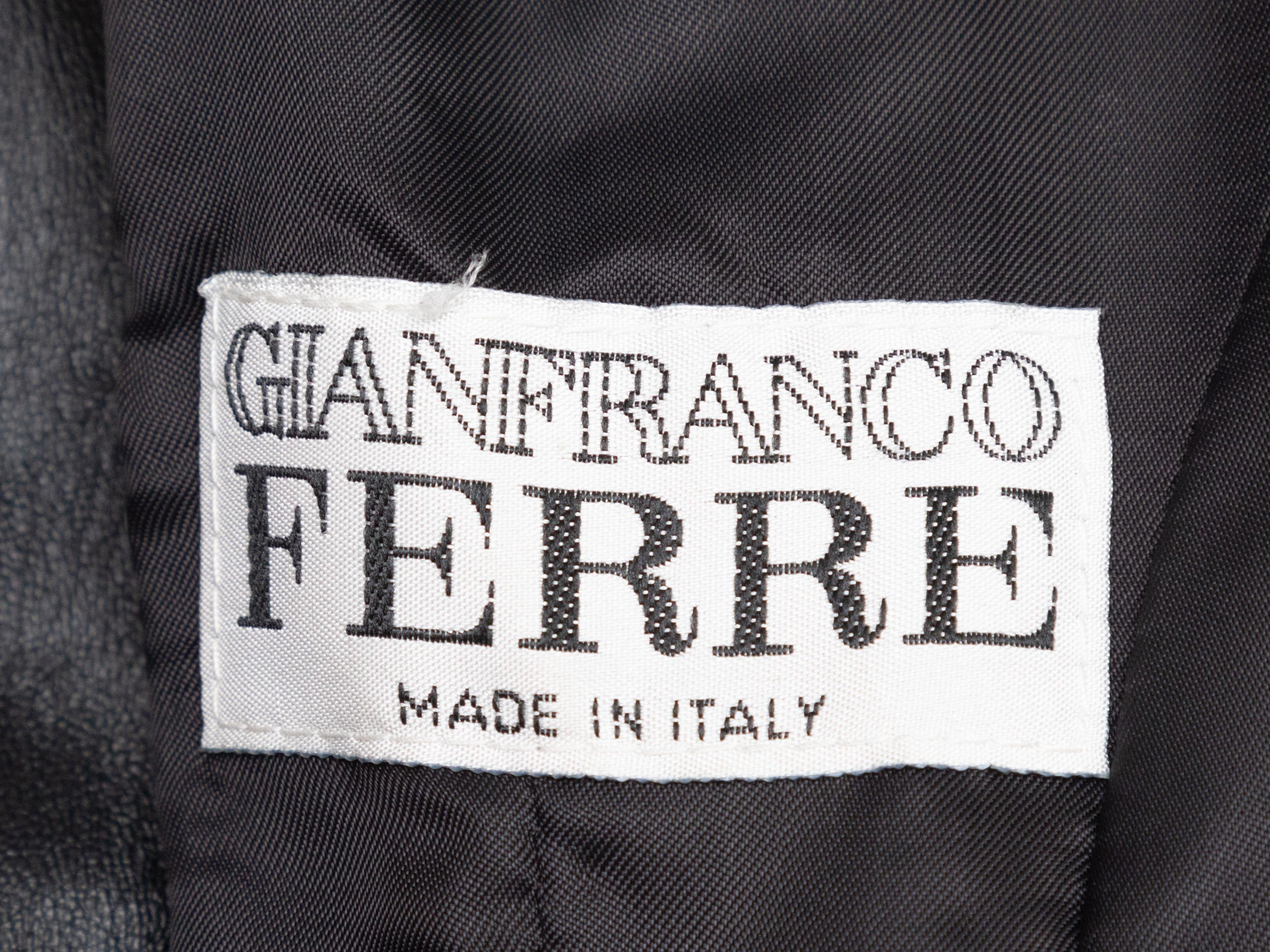 Product Details: Black leather blazer by Gianfranco Ferre. Notched lapel. Dual hip pockets. Lace-up detailing at sides and at sleeves. Button closures at front. 36