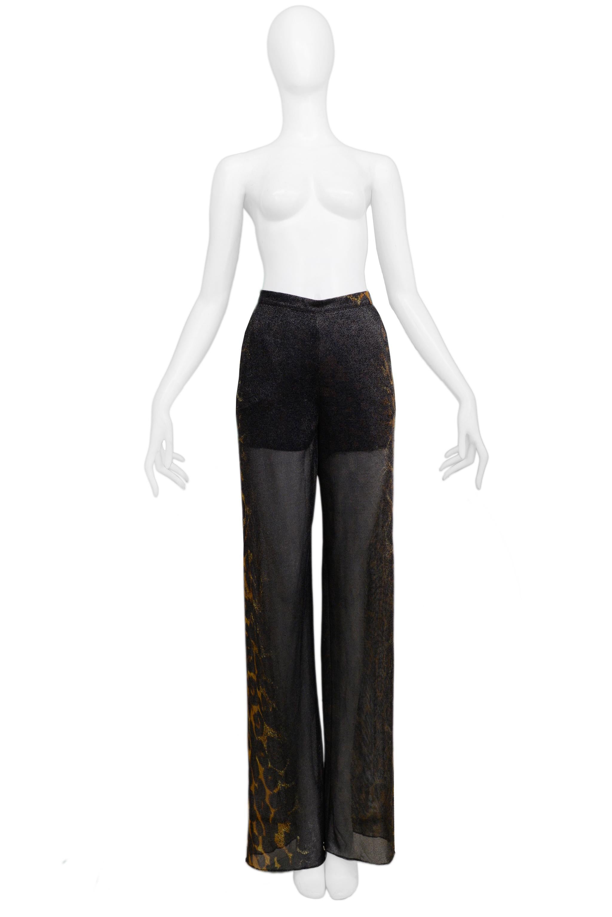 Resurrection Vintage is excited to offer a pair of vintage Gianfranco Ferre black sheer high-waisted pants featuring leopard print, interior shorts, center back zipper, and full legs. 

Gianfranco Ferre
Size About 44
Silk, Rayon, and Nylon
Excellent