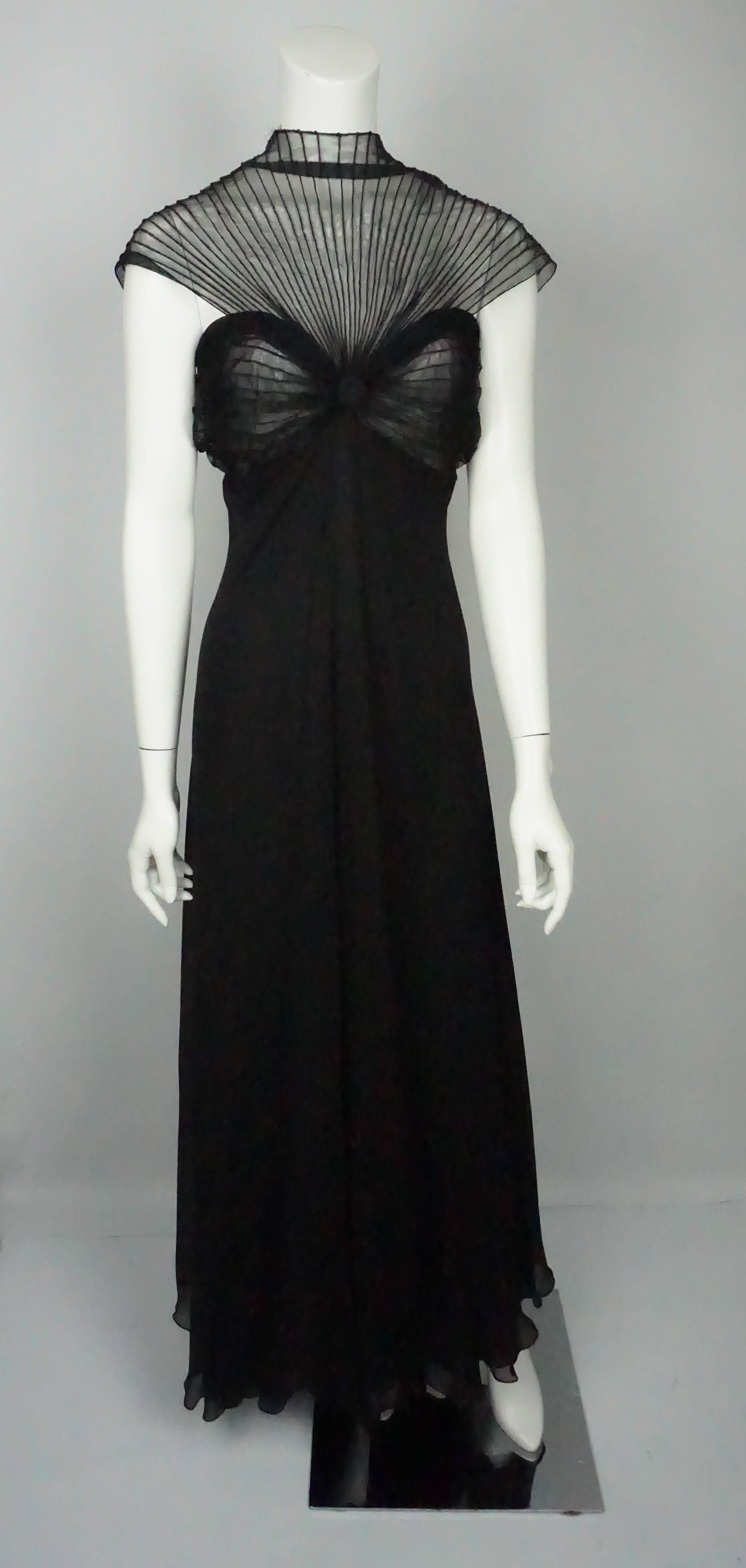 Gianfranco Ferre Black Silk Chiffon Pleated Empire Style Gown - 44  This stunning dress is in excellent condition. The top of the dress is completely sheer and is made up of a netting material and has sewn in lines that give it an interesting