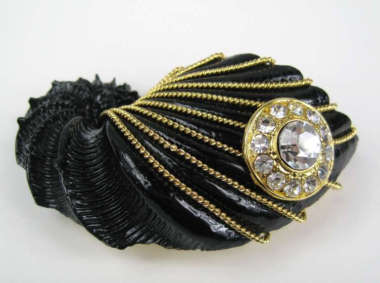 Large Black Gold Tone 24K Plated with massive Crystals set. Measuring 3.33 in / 84.73 mm wide X 1.84 in / 46.94mm top to bottom. This is out of a massive collection of New Old stock items as well as  Hopi, Zuni, Navajo, Southwestern, sterling