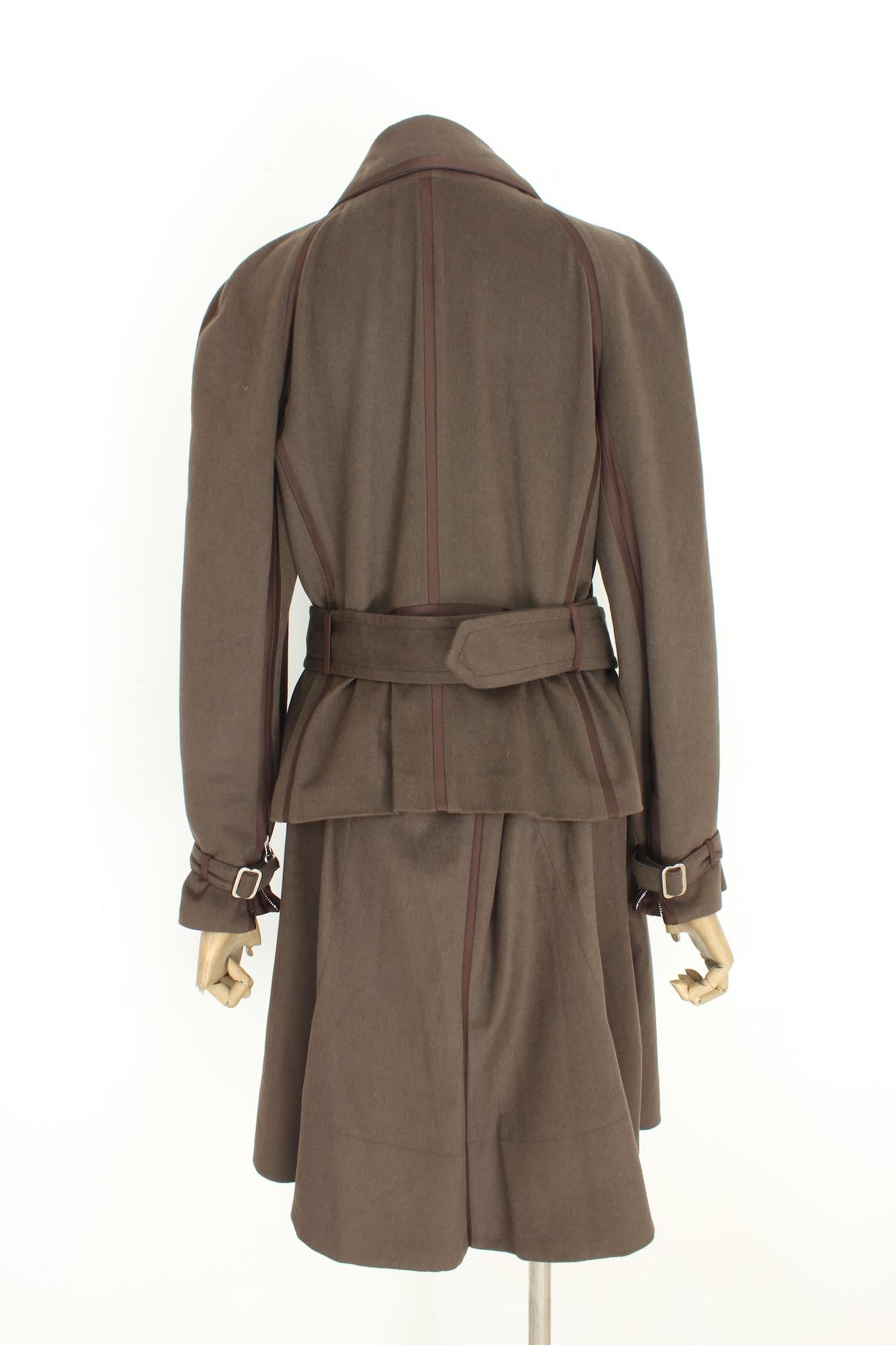Gianfranco Ferre classic vintage 90s suit. Jacket and skirt in soft fine fabric from orylag to cashgora. Brown colour, the fitted jacket with removable collar, zip closure and belt at the waist, there are also zips on the sleeves. Flared midi skirt