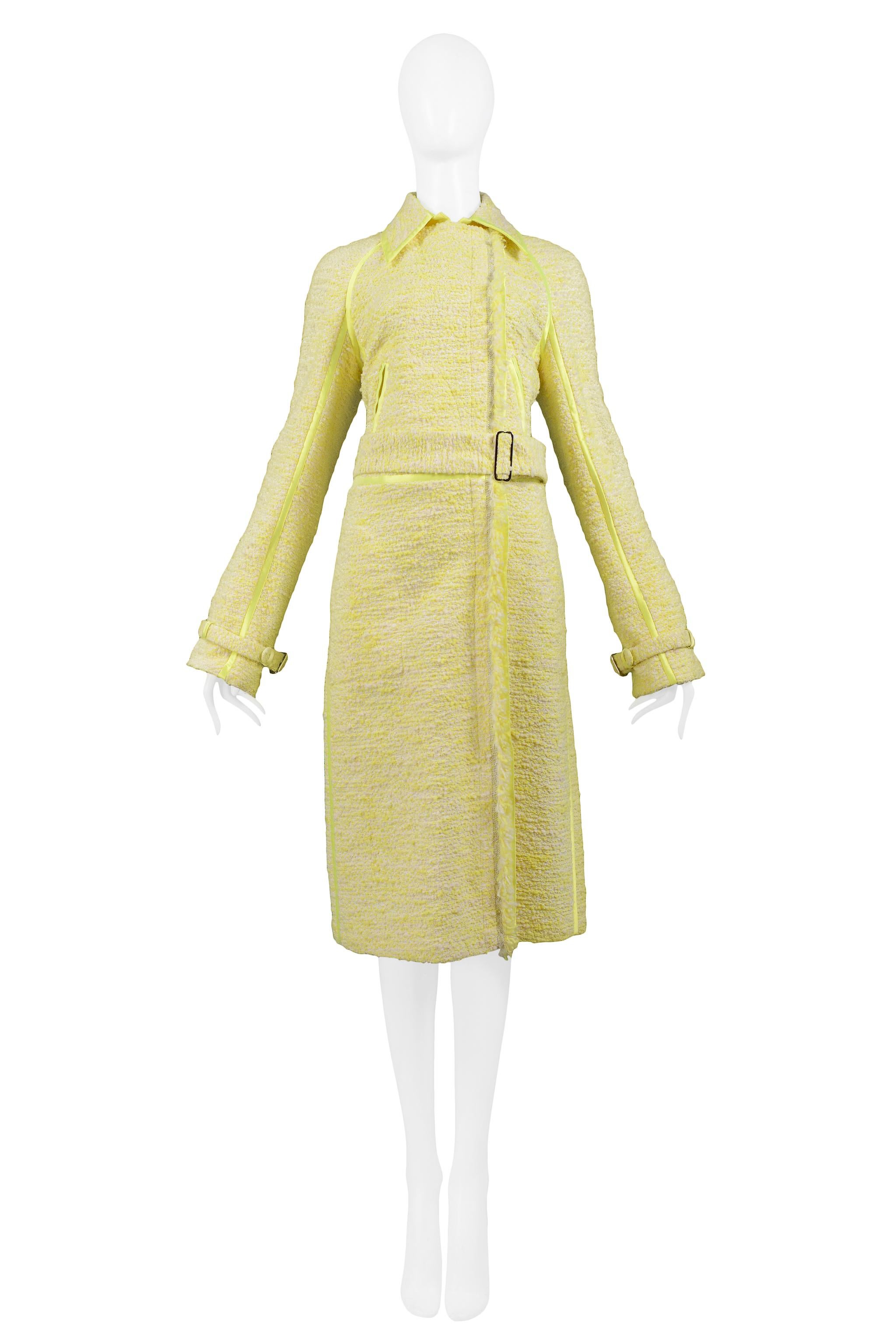 Resurrection Vintage is excited to offer a vintage Gianfranco Ferre citron-yellow wool boucle coat featuring an off-center closure, belted waist & cuffs, slit pockets, and exposed trim detailing throughout. 

Gianfranco Ferre
Size 40
Wool &