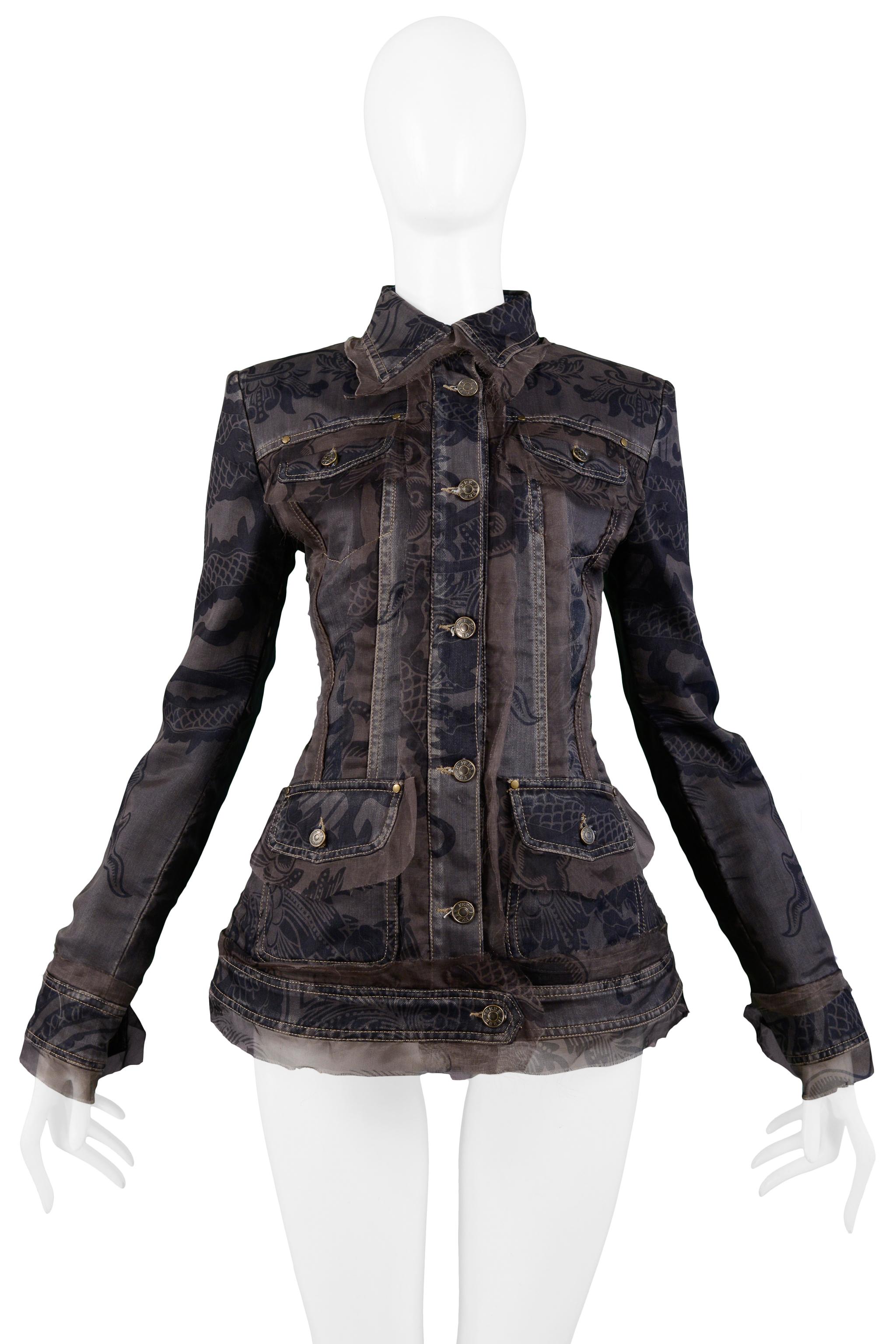 Resurrection Vintage is excited to offer a vintage Gianfranco Ferre denim jacket featuring printed organza overlay, flap collar, silver rivets and snaps, raw edges, and four front pockets.  

Gianfranco Ferre Label
65% Silk, 35% Cotton,
100% Silk