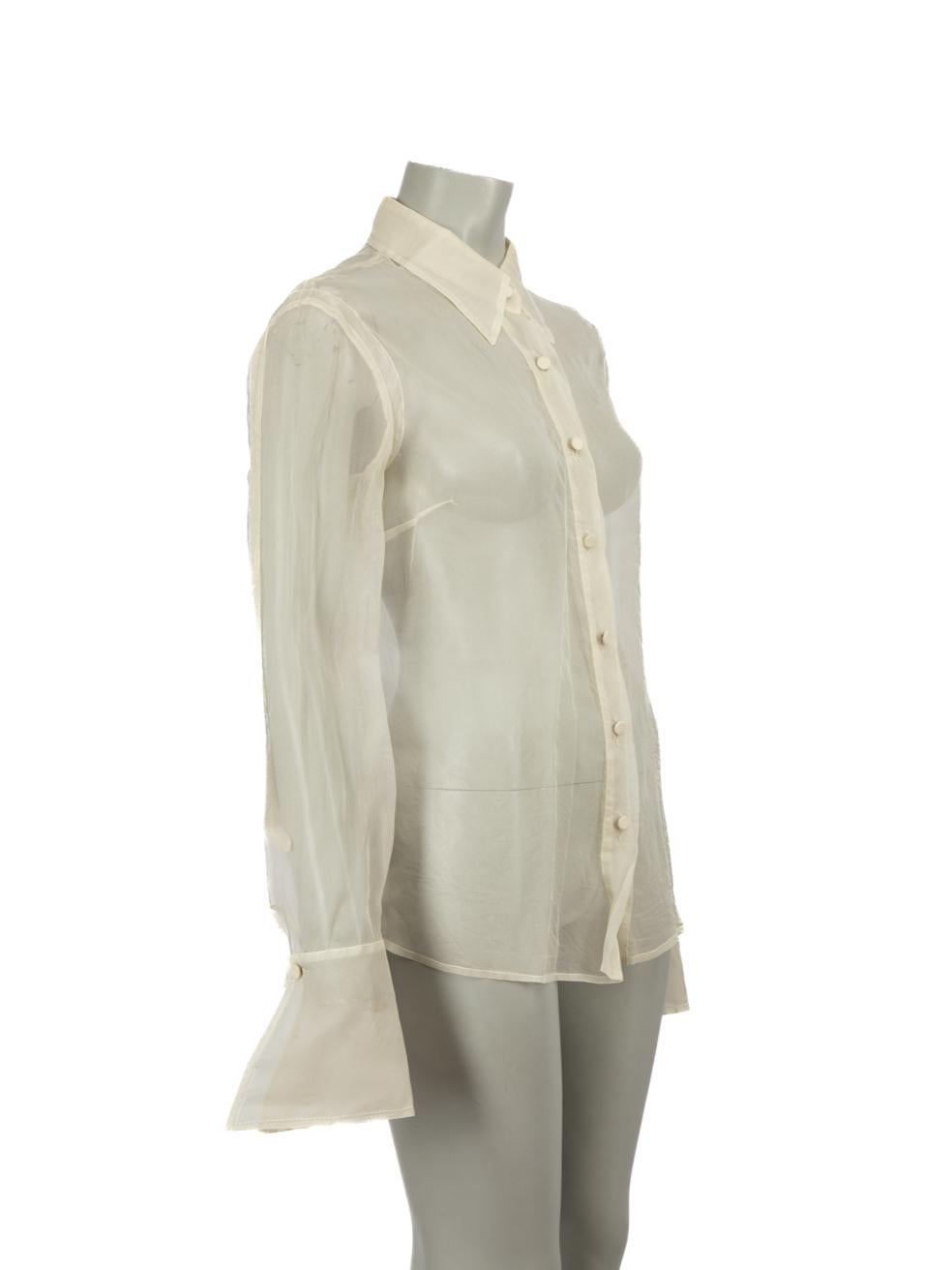 CONDITION is Very good. Minimal wear to shirt is evident. Minimal wear to seams with some minor pulls to the weave under the arms and a discoloured mark at the right cuff on this used Gianfranco Ferré designer resale