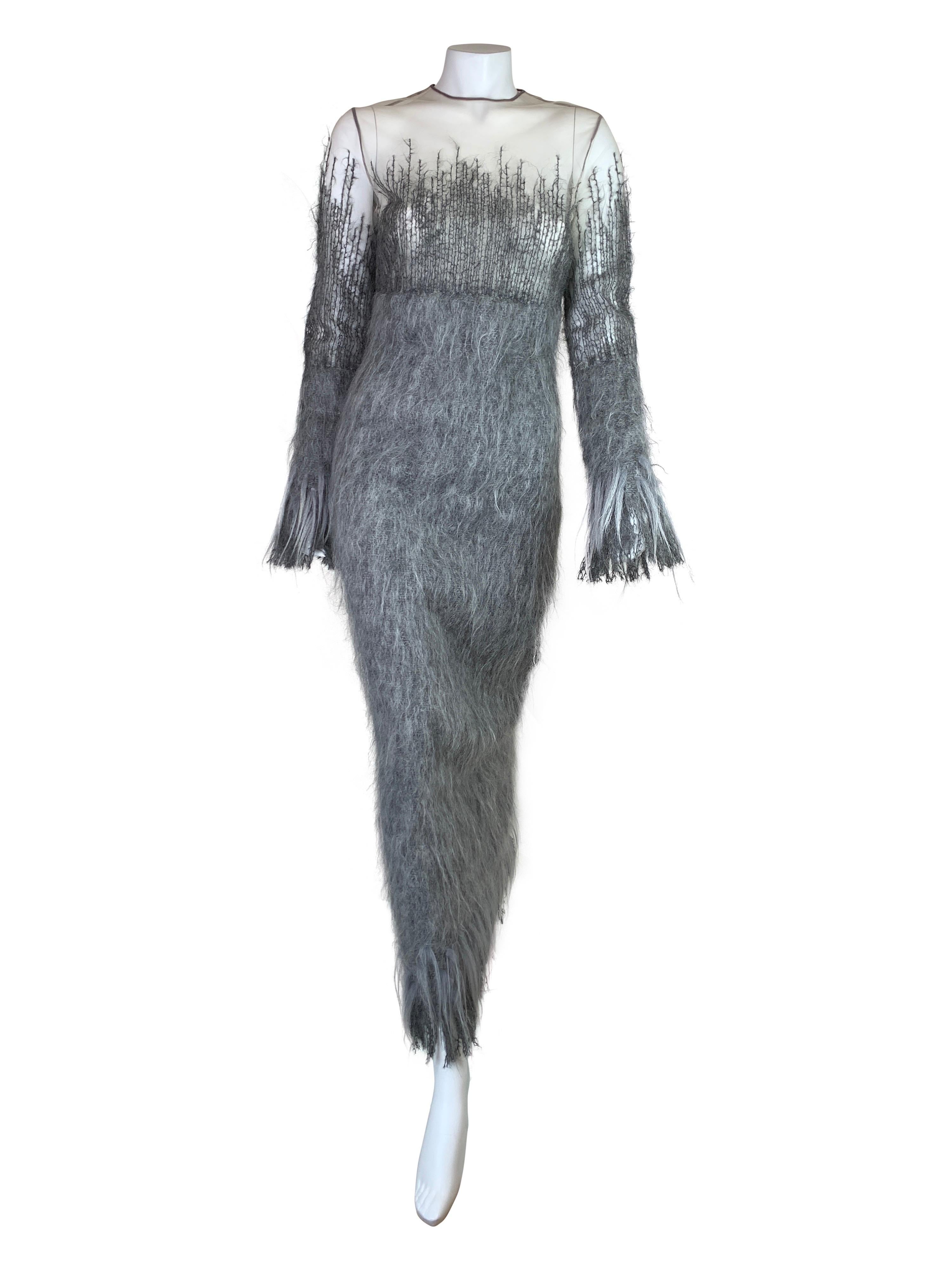 An absolutely stunning extravagant mohair dress from Gianfranco Ferré with tags still attached.

Size IT 42.

Measurements (flat lay on one side):

Shoulder to shoulder - 42 cm (16,5 in)
Armpit to armpit - 48 cm (19 in)
Waist - 42 cm (16,5 in) 
Hips