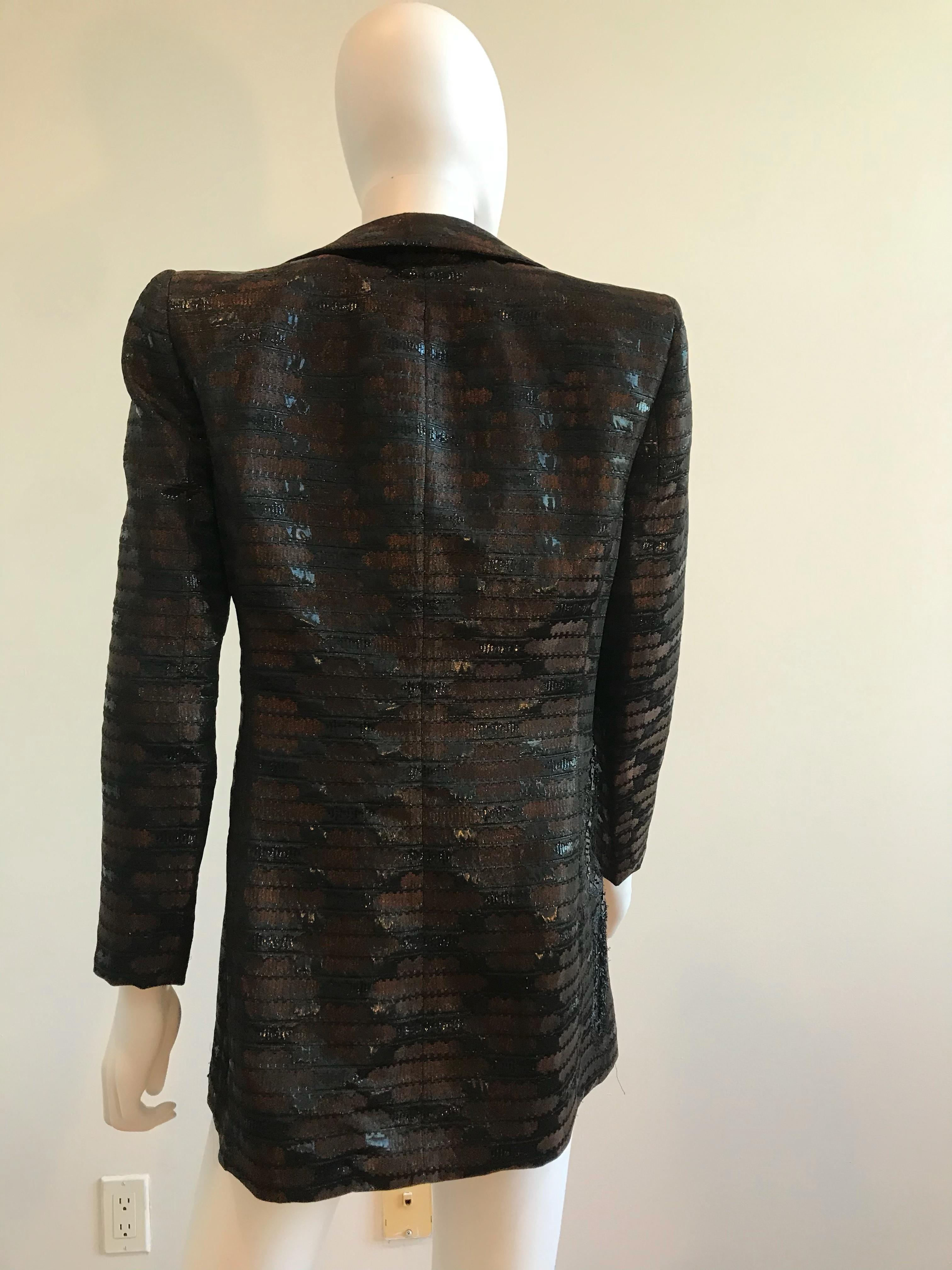 Gianfranco Ferre Floral Cutout Evening Blazer
Made In Italy
Size 40
Beaded side cutout
Button enclosure
Purchasing this item continues its narrative and reduces the environmental impact of using new resources. You can be confident that you’re making