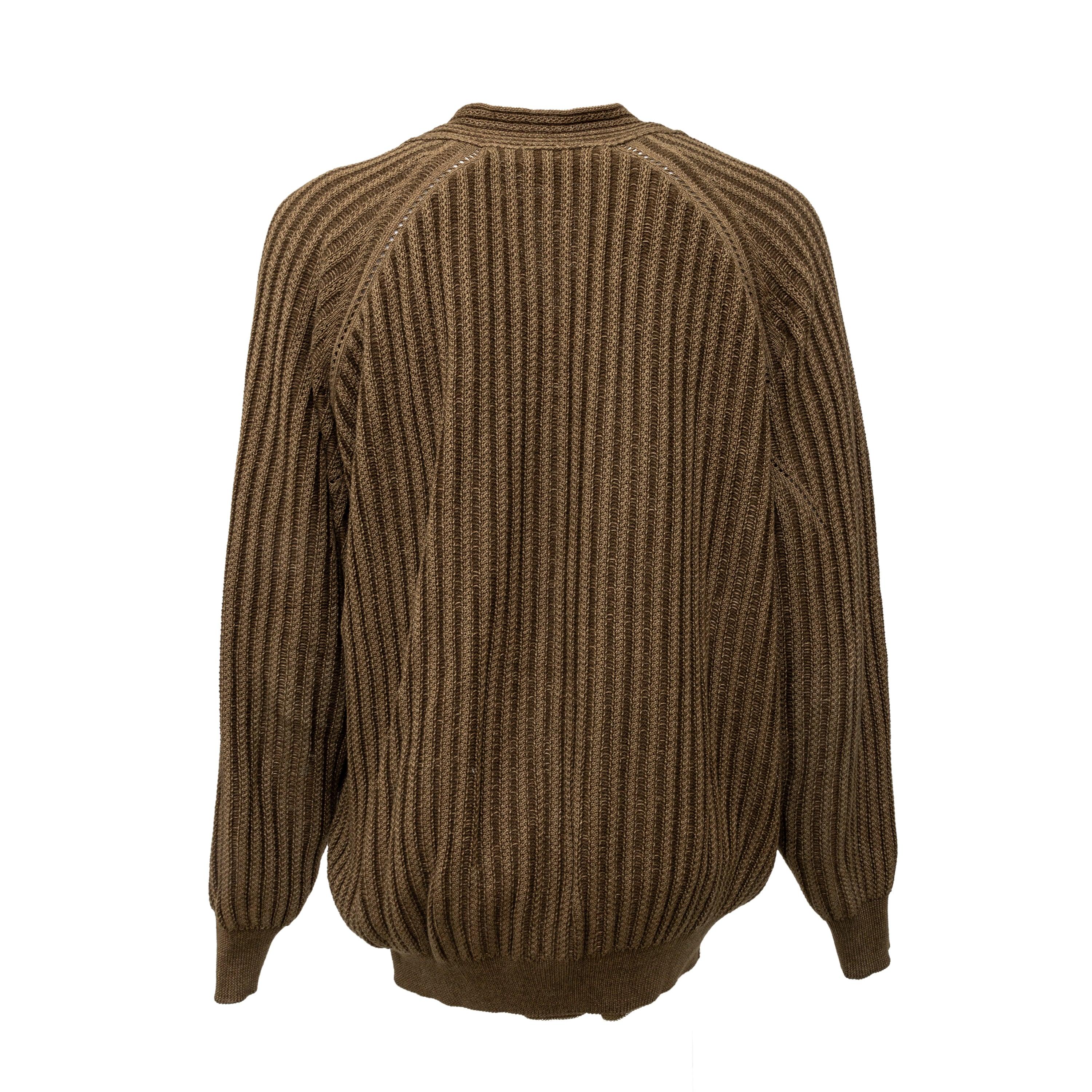 The Gianfranco Ferré knit cardigan combines the luxurious softness of merino wool with the comfort of cotton. With a v-neck and front button closure, this dark olive cardigan features a relaxed fit. The inner mesh layer adds a touch of flair with a