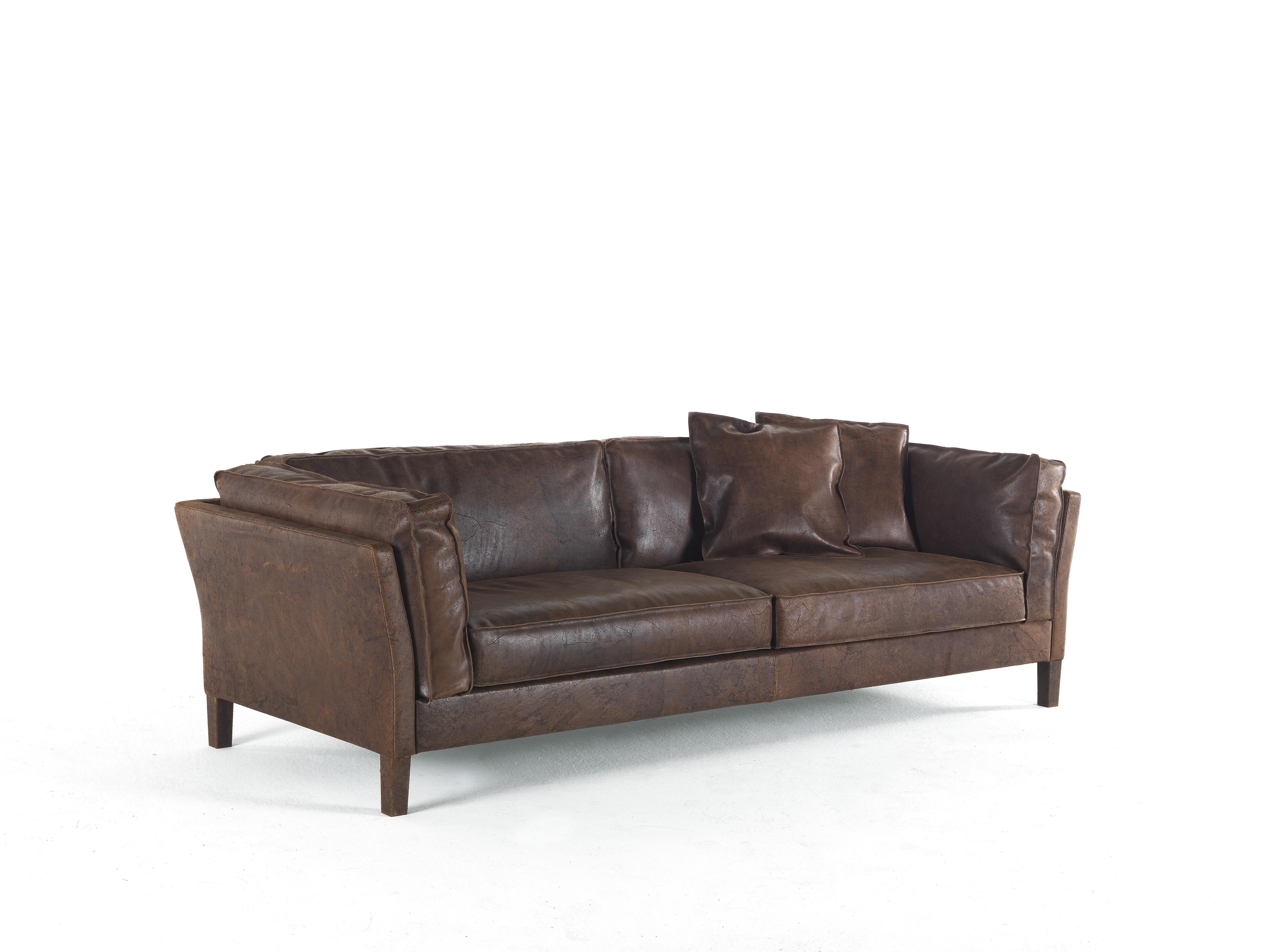 Loft 3-seater sofa with structure in beech wood and foam. Upholstery in leather cat. B Grunge L.13.01 Antique Dark Brown. Feet in solid beech wood dyed Smokey Grey. Decorative cushion set not included.