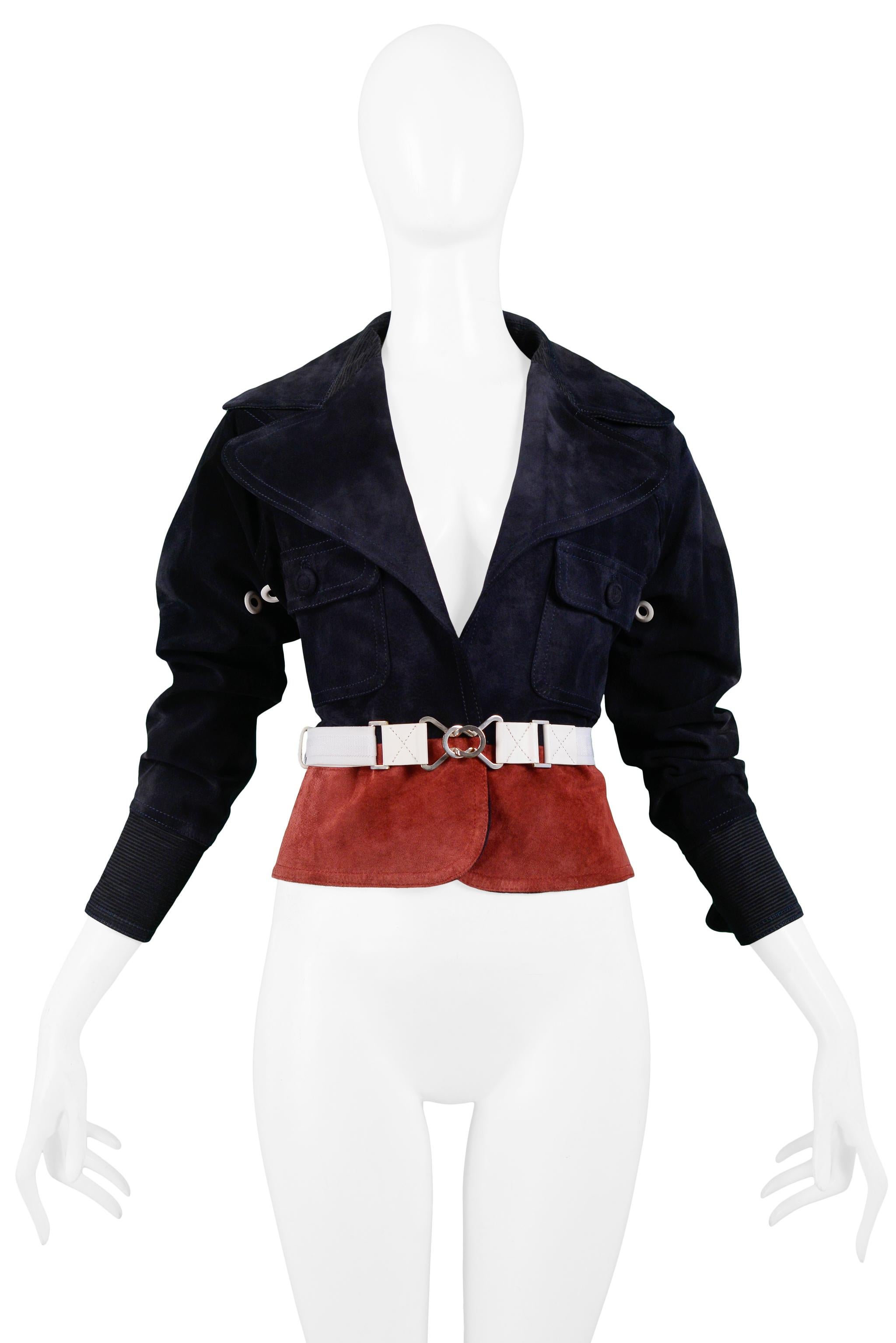 Resurrection Vintage is excited to offer a vintage Gianfranco Ferre navy suede jacket featuring burgundy suede waist panel, white belt with silver-tone metal, large front pockets, white grommets, and wide lapels.

Gianfranco Ferre Label
100% Pig