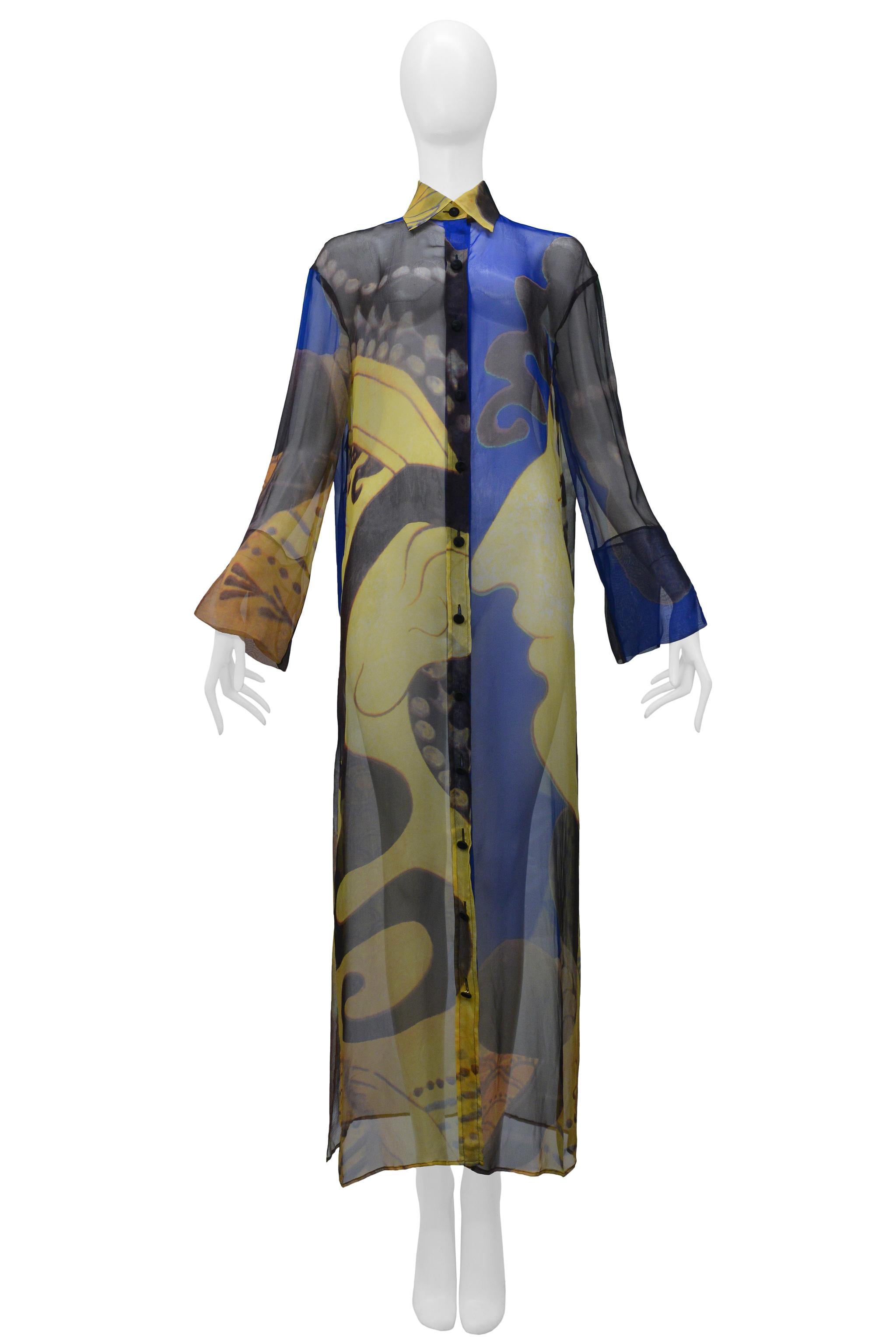 Resurrection Vintage is excited to offer a vintage Gianfranco Ferre multicolor chiffon caftan shirt dress featuring decorative print, slit cuffs, button front placket, and folding collar. 

Gianfranco Ferre
Size 40
Silk, Polyester 
Excellent Vintage