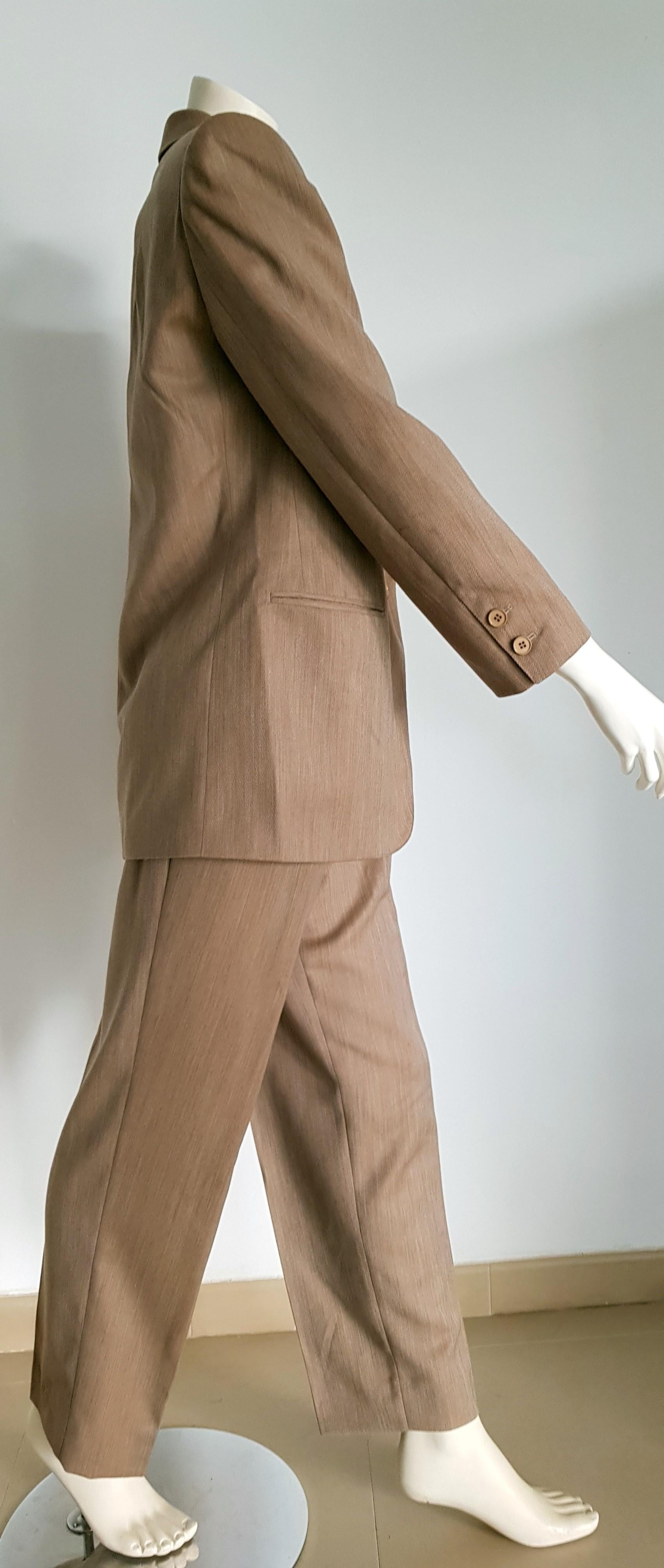 Gianfranco FERRE light brown jacket pants wool suit - Unworn, New
..
SIZE: equivalent to about Small / Medium, please review approx measurements as follows in cm. 
JACKET: lenght 78, chest underarm to underarm 55, bust circumference 98, shoulder