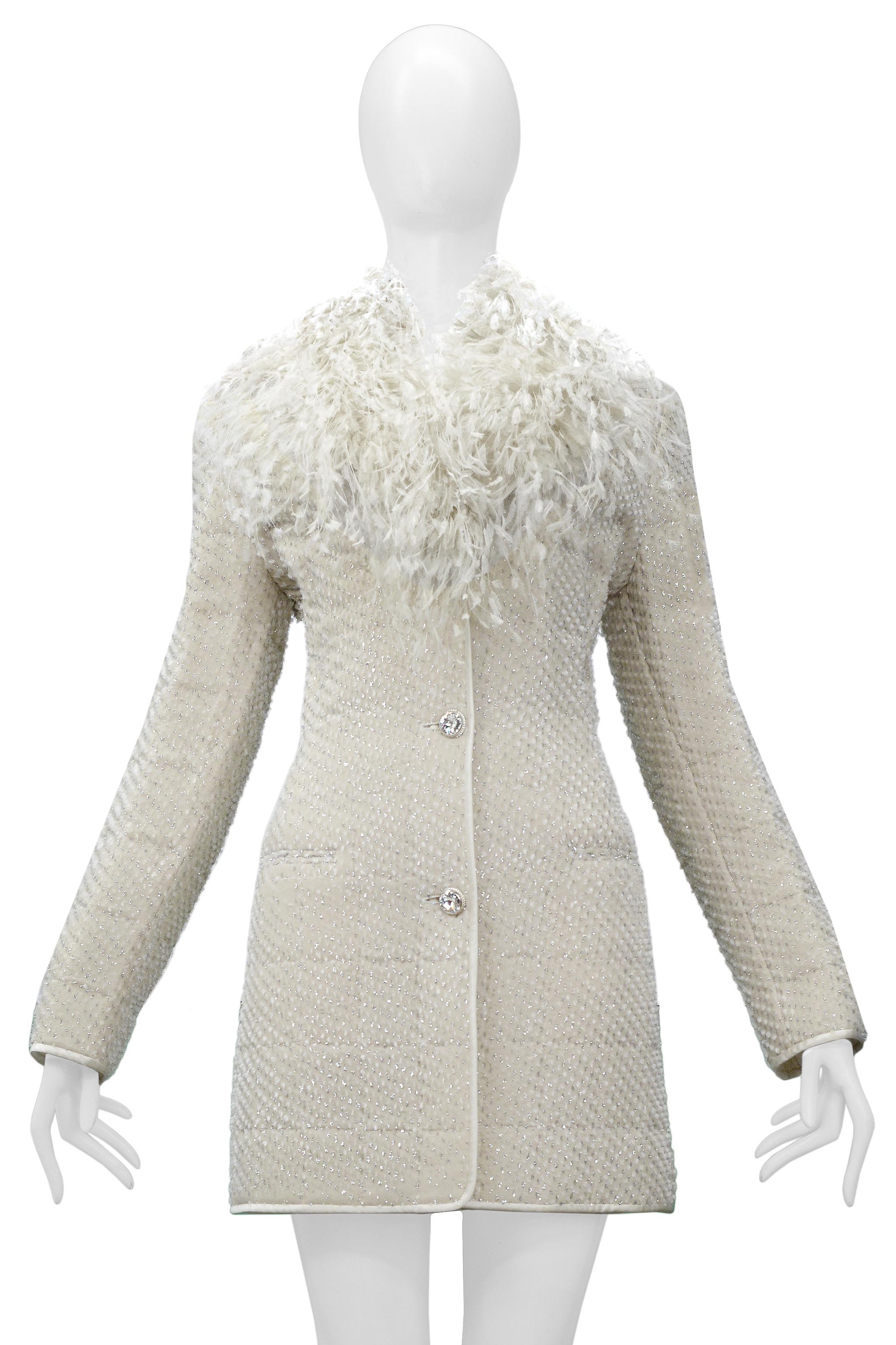 Resurrection Vintage is excited to offer a vintage Gianfranco Ferre off-white silk evening coat with rhinestone buttons, contrasting satin trim, silver metallic threads, padded body, silk lining, and feathers around the collar. 

Gianfranco