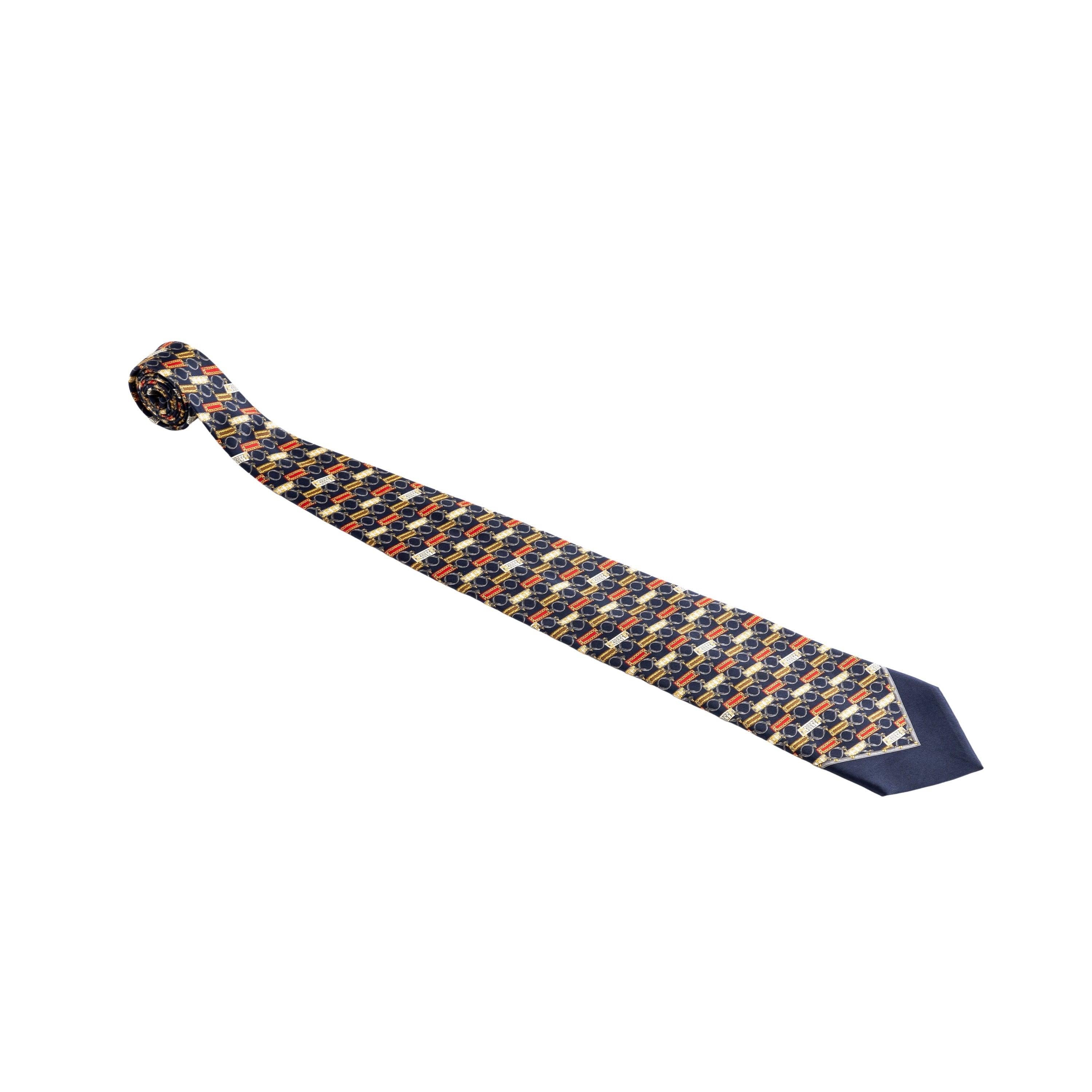 Achieve a bold, vintage look with the Gianfranco Ferré Printed Silk Tie. Made of luxurious silk, this multicolor tie features a striking pattern of chains in block, accented with the iconic Ferré logo.
Remarks: There is a small stain inside.

Total