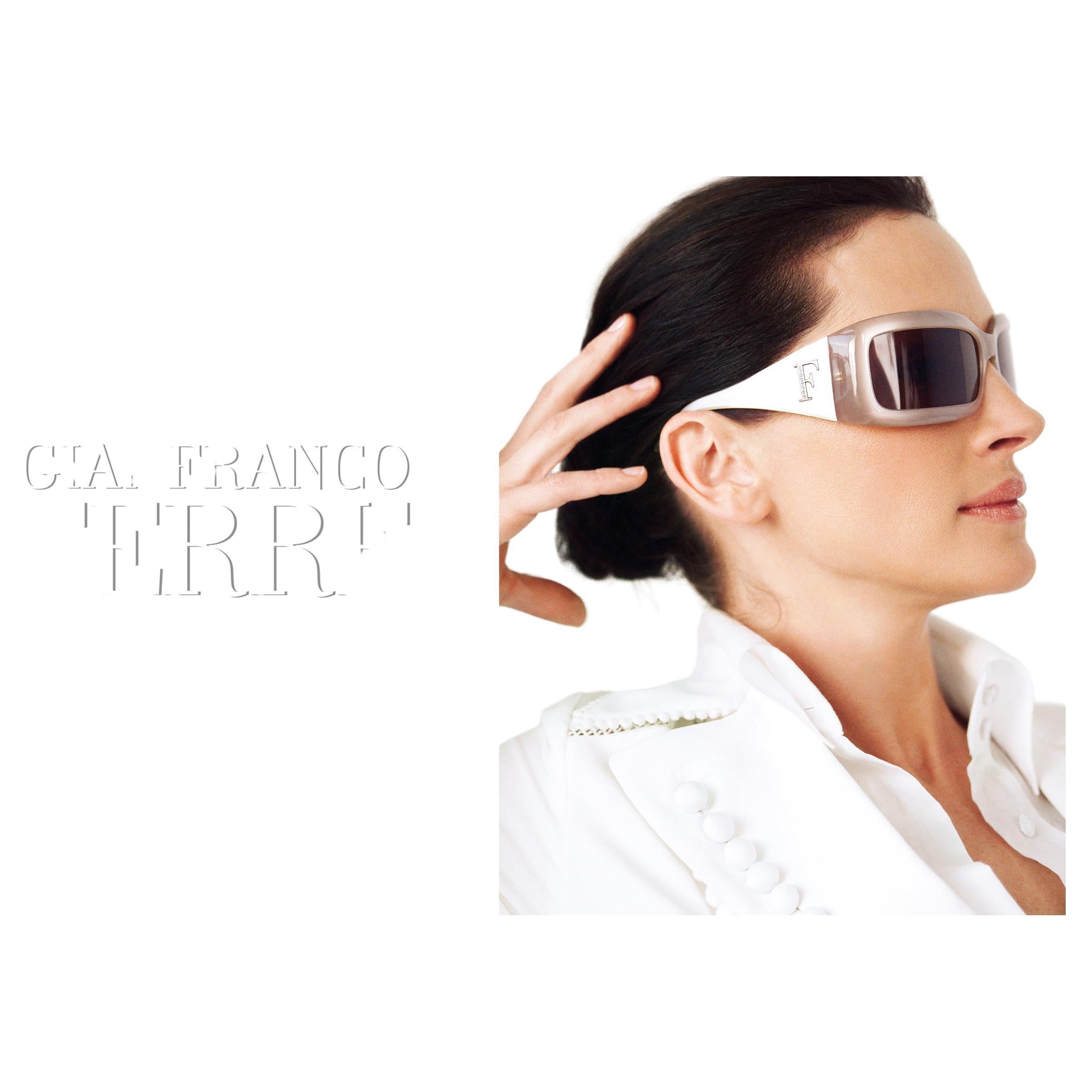 - Gianfranco Ferrè maxi sunglasses
- Sold by Gold Palms Vintage
- Spring/Summer 2006
- Pearl beige maxi sunglasses
- Maxi Swarovski logo on both temples
- Campaign piece, famously worn by Julia Roberts
- Comes with original frame