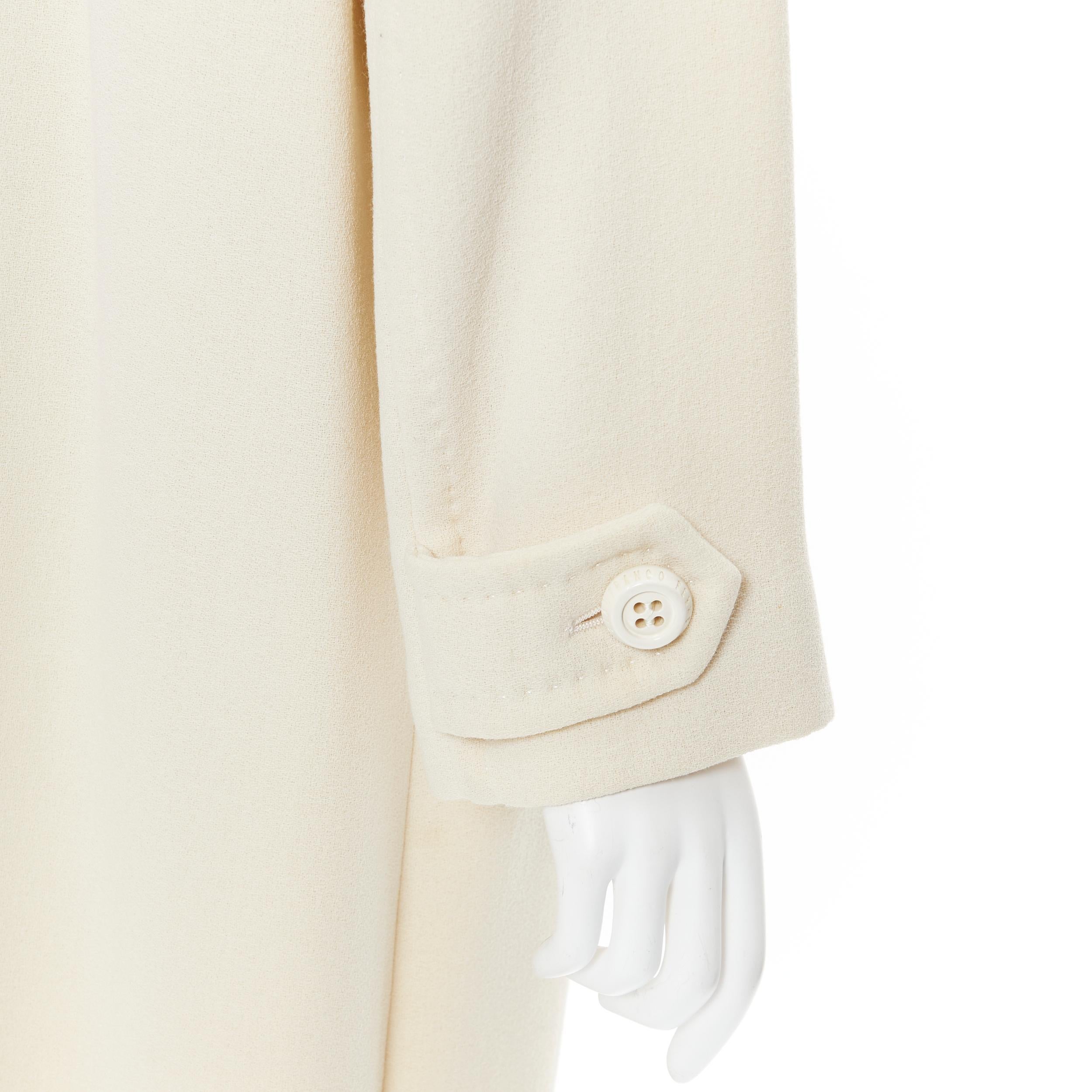 GIANFRANCO FERRE STUDIO ivory wool crepe double breasted coat jacket IT42 M 
Reference: GIYG/A00015 
Brand: Gianfranco Ferre Studio 
Designer: Gianfranco Ferre 
Material: Wool 
Color: White 
Pattern: Solid 
Closure: Button 
Extra Detail: Hand