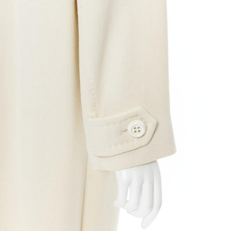 GIANFRANCO FERRE STUDIO ivory wool crepe double breasted coat jacket IT42 M
Reference: GIYG/A00015
Brand: Gianfranco Ferre
Designer: Gianfranco Ferre
Model: Double breasted coat
Material: Wool
Color: White
Pattern: Solid
Closure: Button
Lining: