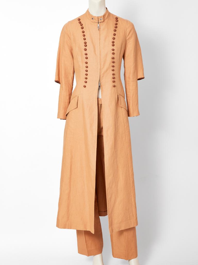 Gianfranco Ferre, clay tone, Victorian  inspired , linen duster and pant ensemble. Duster has a fitted bodice, with a zipper closure that starts at the waist, and ends at the neck.  From the waist down there is an open slit for movement. Bodice is