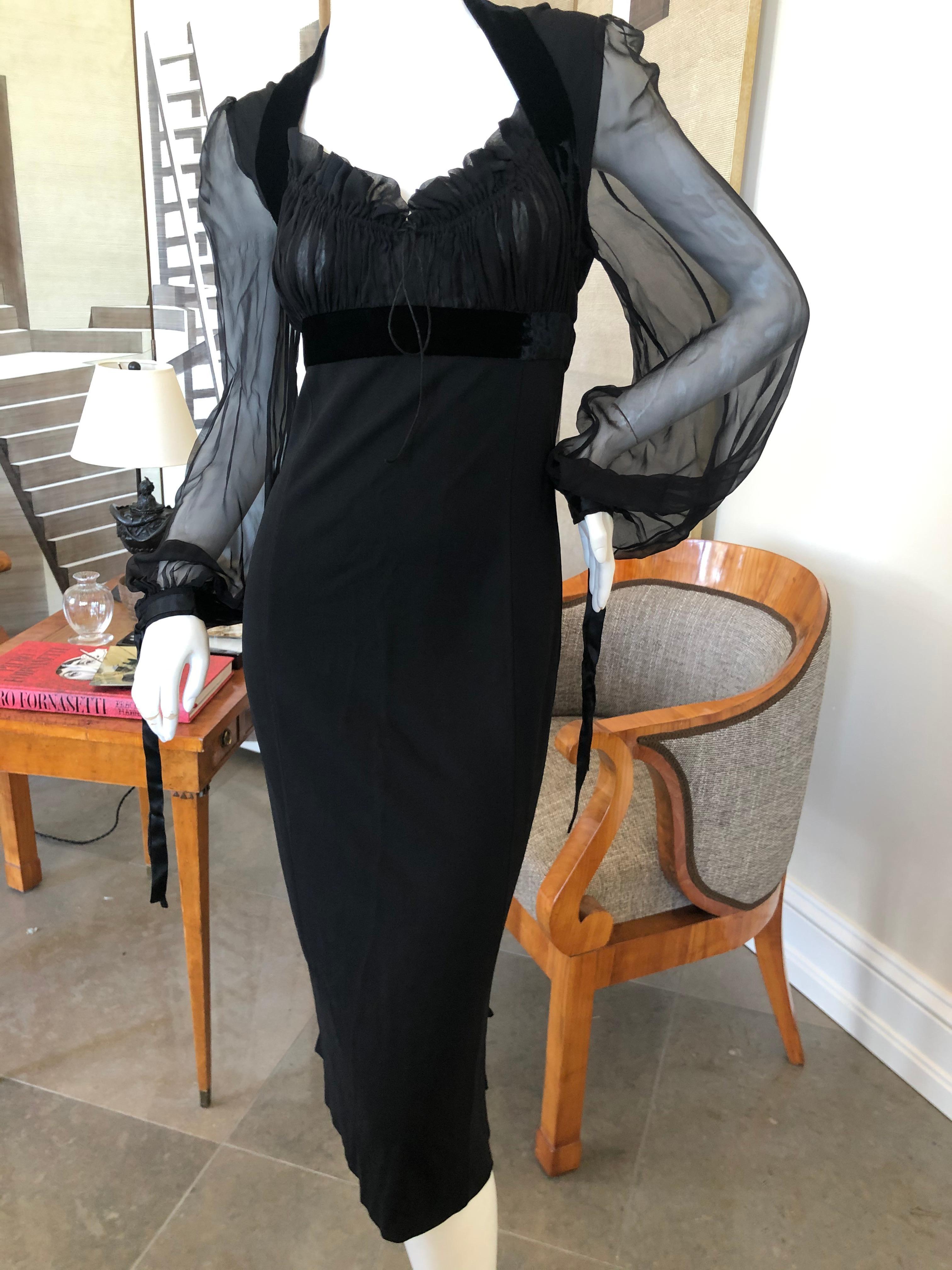 Gianfranco Ferre Vintage 80's Little Black Dress with Sheer Bishop Sleeves
Exquisite black dress from Gianfranco Ferre, who not only designed his own brilliant collections
 he also designed for Christian Dior in the years between Marc Bohan and John