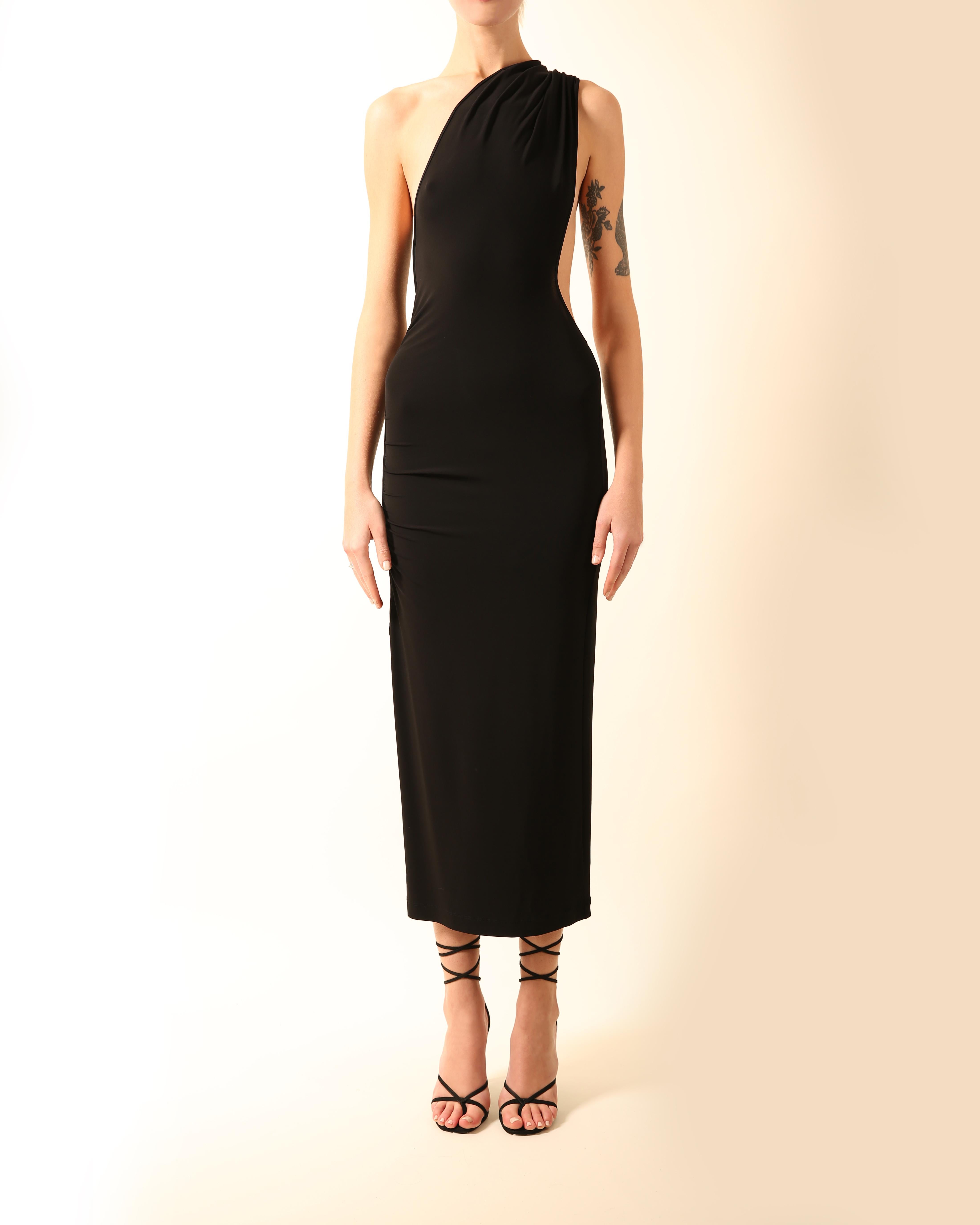 Gianfranco Ferré white vintage midi dress in black stretch fabric
One shoulder with a beautiful cut out side and back

FREE SHIPPING WORLDWIDE!!!

Composition:
96% Viscose, 4% Elastane

Size:
IT 44 but will work for varying sizes due to the fabrics