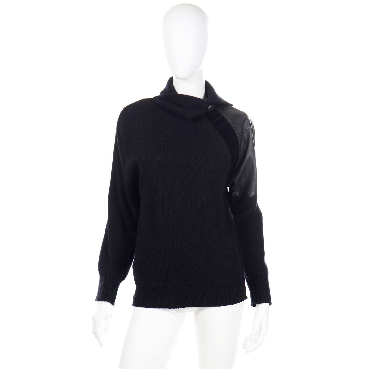 We love vintage Gianfranco Ferre and this fabulous black wool sweater top is a great example of his creativity. This seemingly simple sweater is just the opposite, with exceptional design details. The top has gorgeous black leather and black velvet