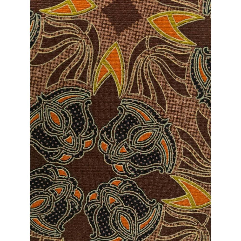 Gianfranco Ferré brown and orange silk 90s tie. Pointed design model.

Measurements
Width: 8,5 cm

Product code: A6442

Composition: 100% Silk

Made in: Italy

Condition: Very good conditions
