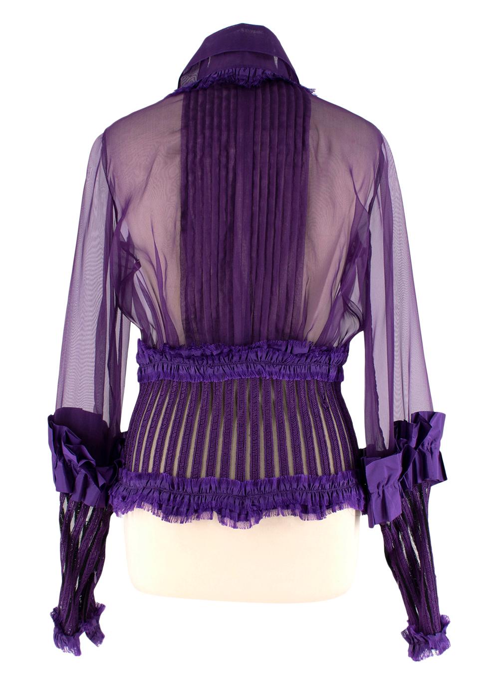 Gianfranco Ferre Vintage Dark Purple Organza Blouse

- Rich dark purple sheer organza blouse featuring lace, ruffles and knitted details
- Classic collar, button-through, long sleeve
- Pair with tailored leather trousers for a modern look