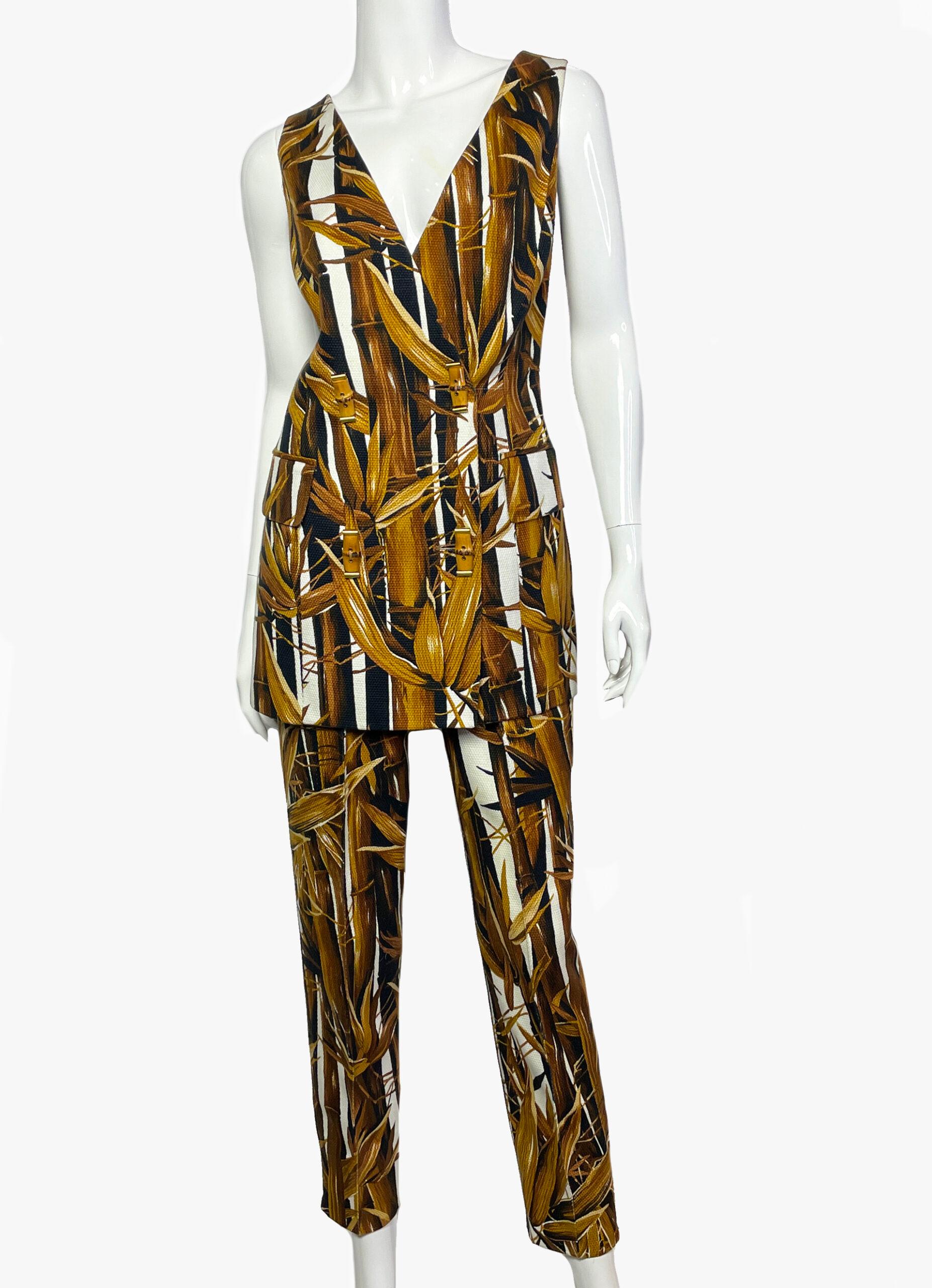 Gianfranco Ferre Vintage Pantsuit with Bamboo Buttons, 1980s

A fabulous vintage women’s two piece pants and vest ensemble from the 80s. The fabric is detailed with a bamboo print and bamboo buttons with gold accents. Perfect for a party or formal
