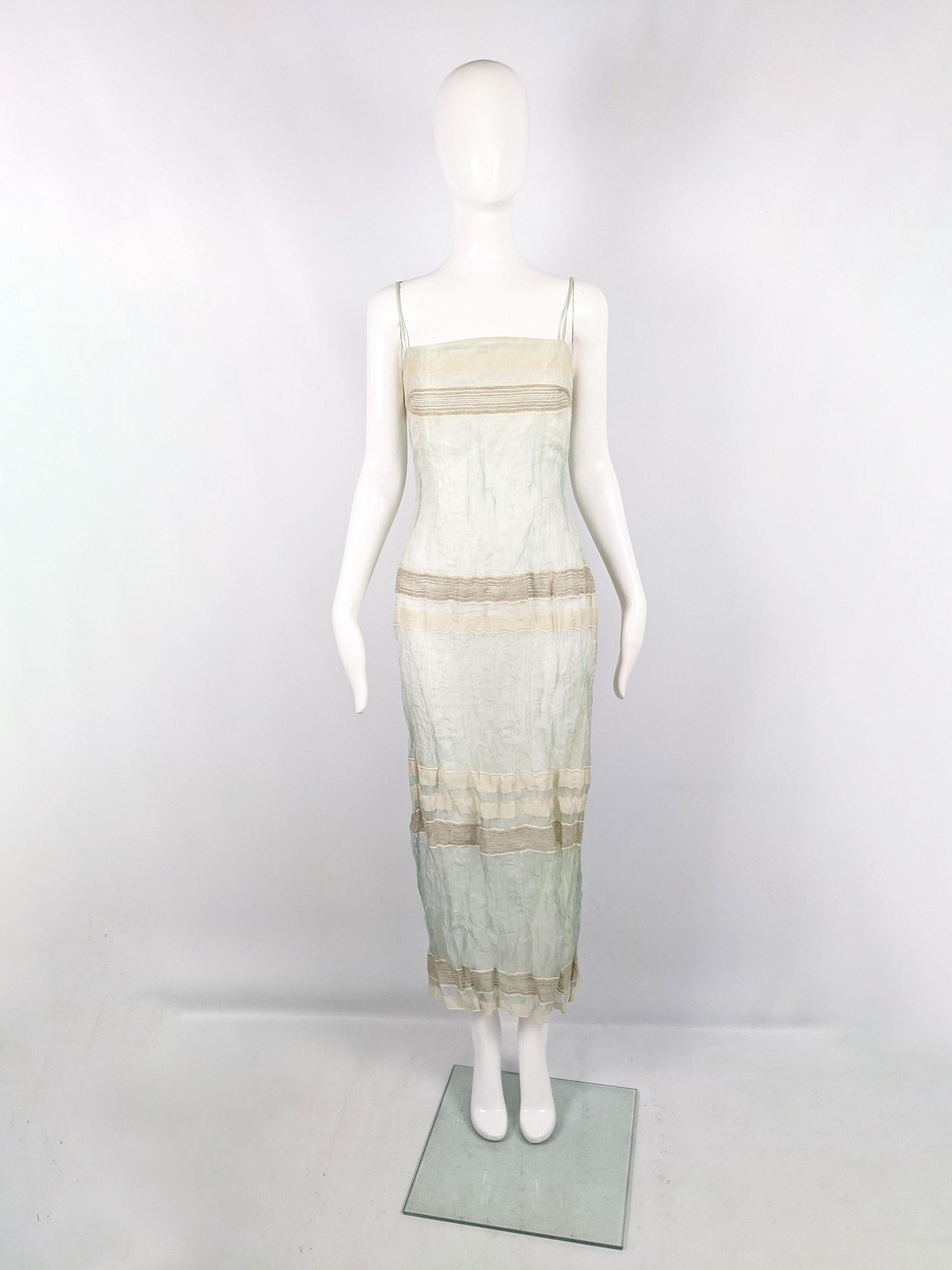 A stunning, effortless vintage womens strapless dress from the 90s by Gianfranco Ferré. It is made from an incredible pastel blue, crinkled organza with beige woven linen stripes throughout. Perfect for summer or at a party in the evening. Can be