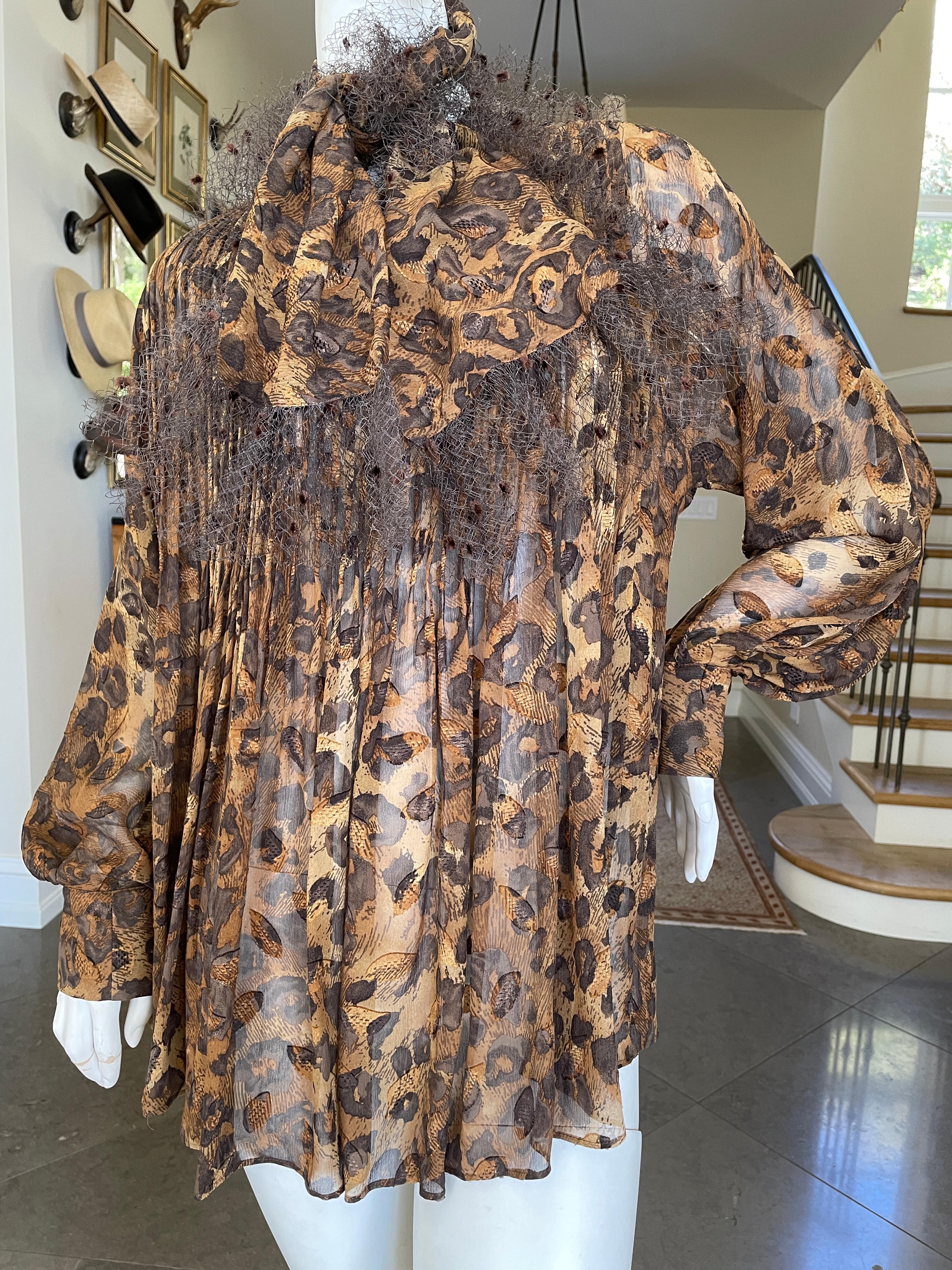  Gianfranco Ferre Vintage Sheer Pleated Leopard Print Silk Blouse with
 Lace Trimmed Separate Scarf.
This is an exceptional piece, Ferre was such a talent, and his blouses were his signature .
 Size 42
Bust 38