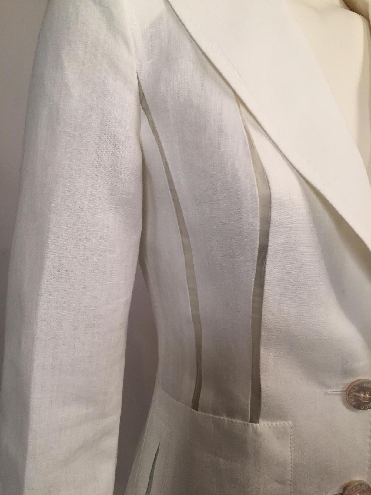 This is a fabulous white linen jacket designed by Gianfranco Ferre, elevated to another level by the addition of sheer white silk organza panels. it has a notched lapel, two button front, patch pockets with a clever opening, and the vertical sheer