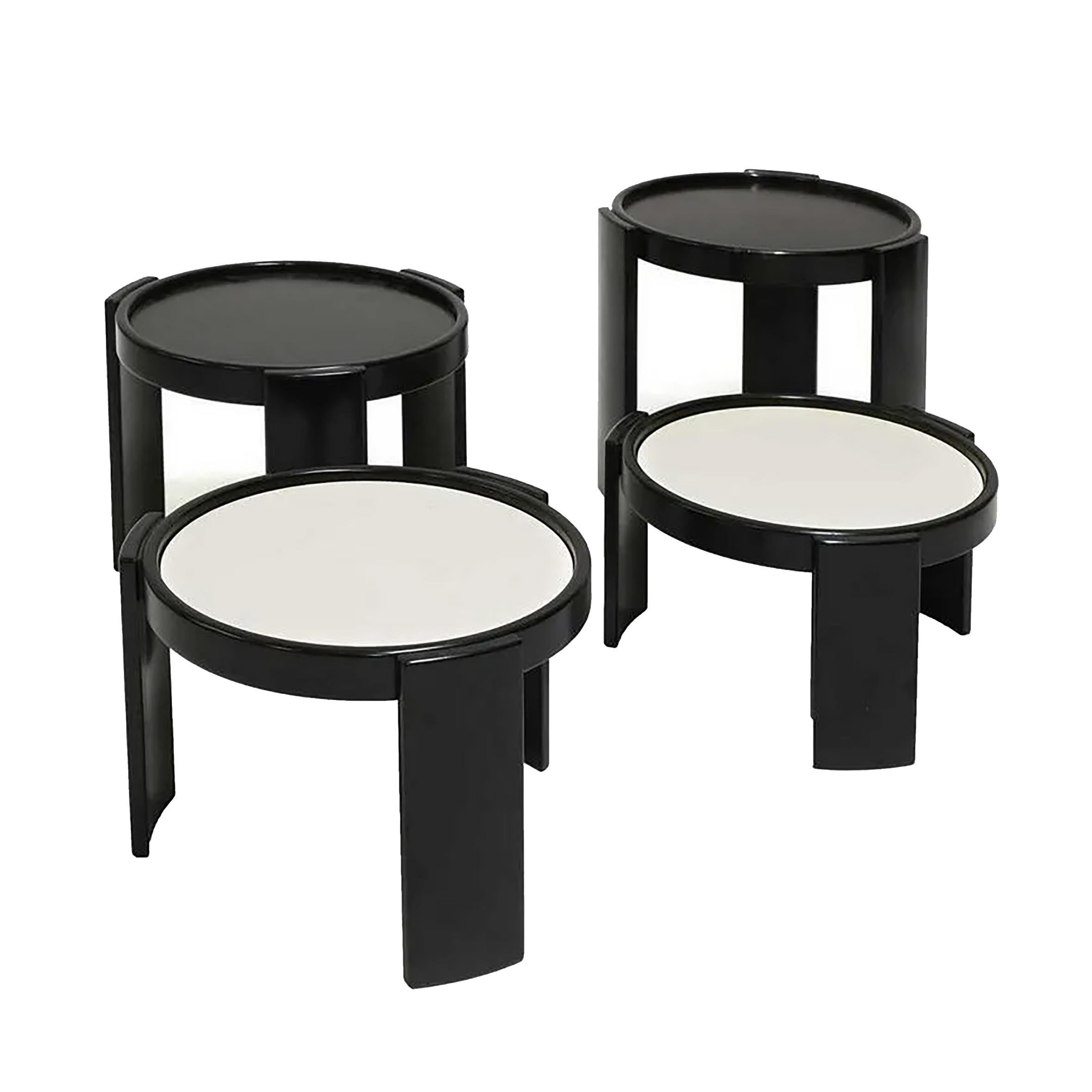 Gianfranco Frattini (1926-2004)

780

A set of four stacking nesting round tables.
The circular black lacquered wood frame with removable reversible black and white laminate tops.
Manufactured by Cassina, Italy.
1966.

Literature
Ottagono