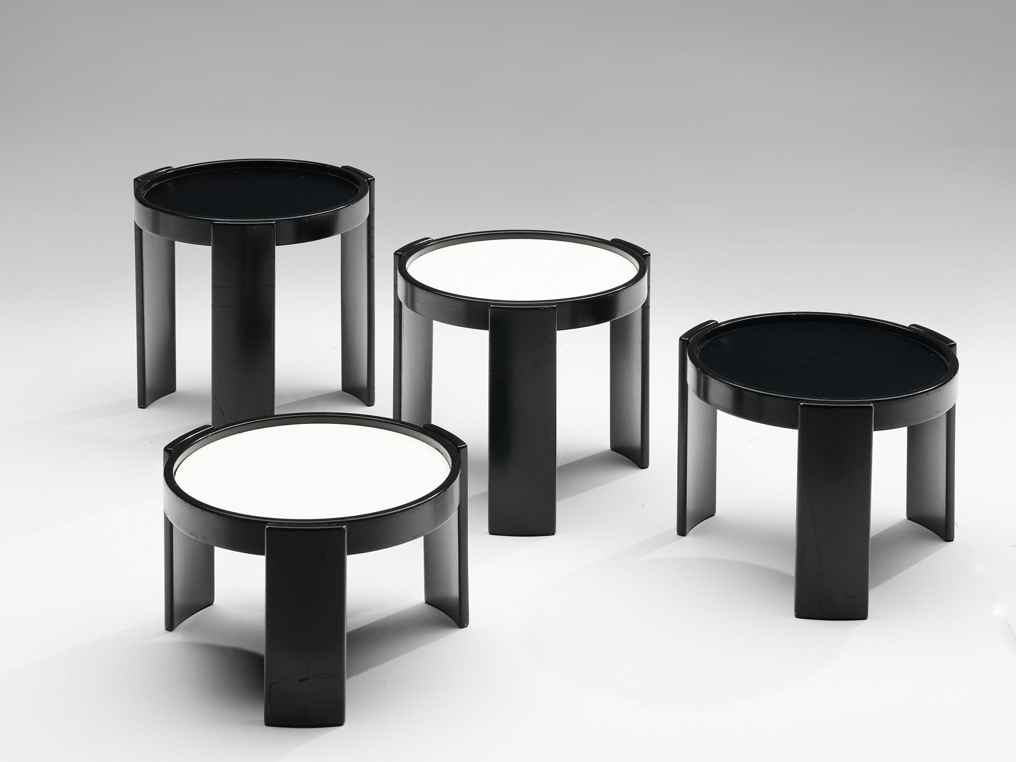 Gianfranco Frattini for Cassina, nesting table, black and white lacquered wood, Italy, 1960s

Nesting tables, consisting of four pieces, designed by Gianfranco Frattini for Cassina. All the tables are black lacquered wood with a reversible white and
