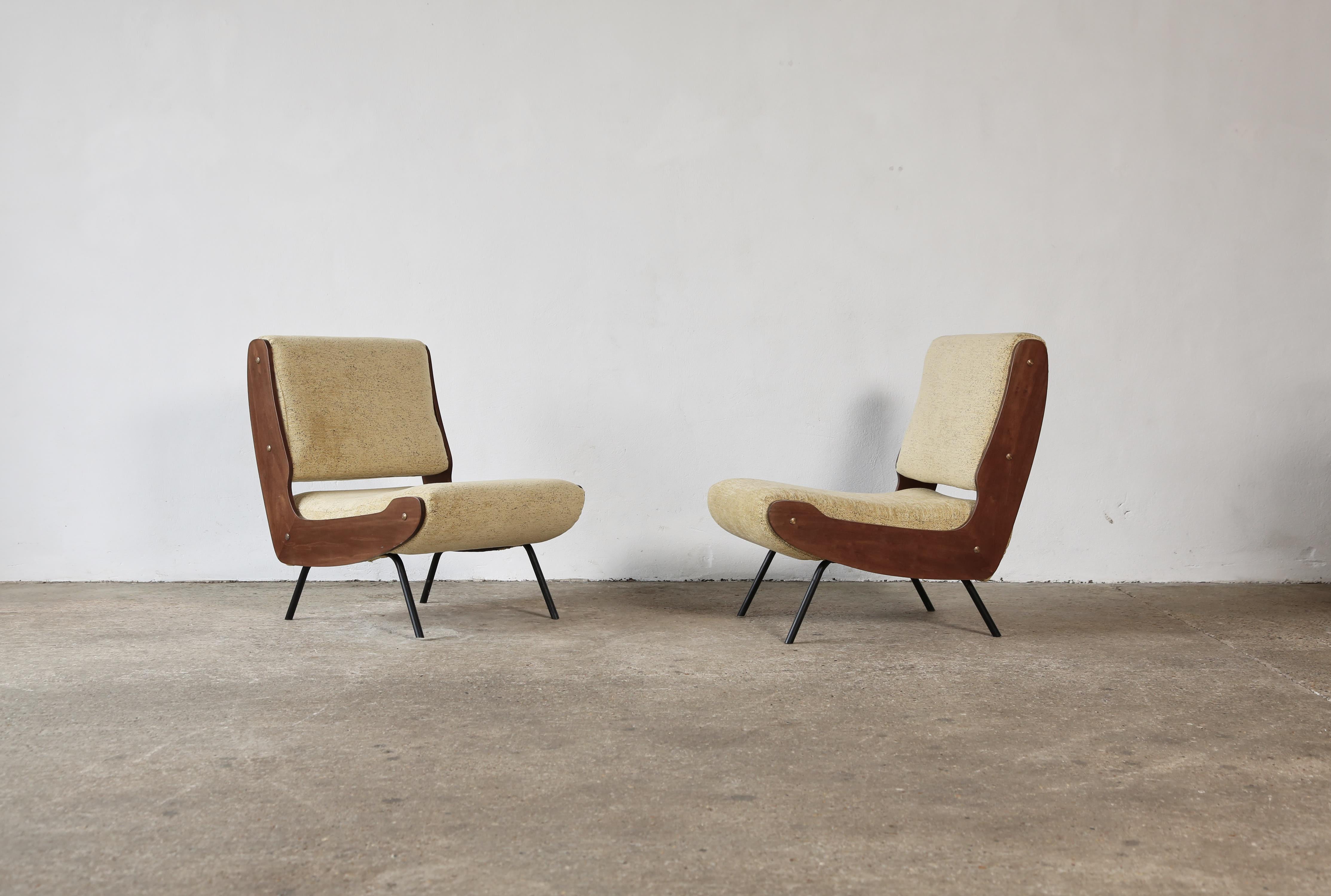 A rare pair of lounge chairs by Gianfranco Frattini, produced by Cassina, Italy, 1950s.  In good original condition - wooden frames and original upholstery.   Fast shipping worldwide.
  


UK customers please note: Prices do not include VAT.