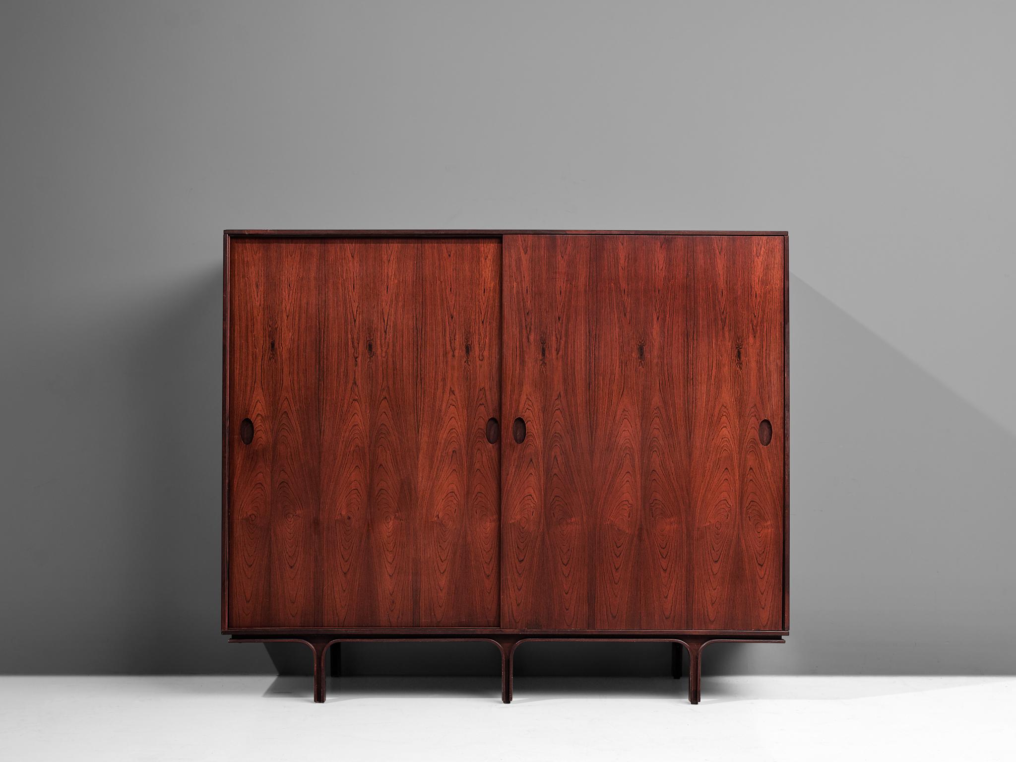 Gianfranco Frattini for Bernini, cabinet, rosewood, Italy, 1950s

Robust yet elegant cabinet designed by Gianfranco Frattini for Bernini in the 1950s. The cabinet features beautiful bookmatched rosewood veneer, showing the warm color of the wood