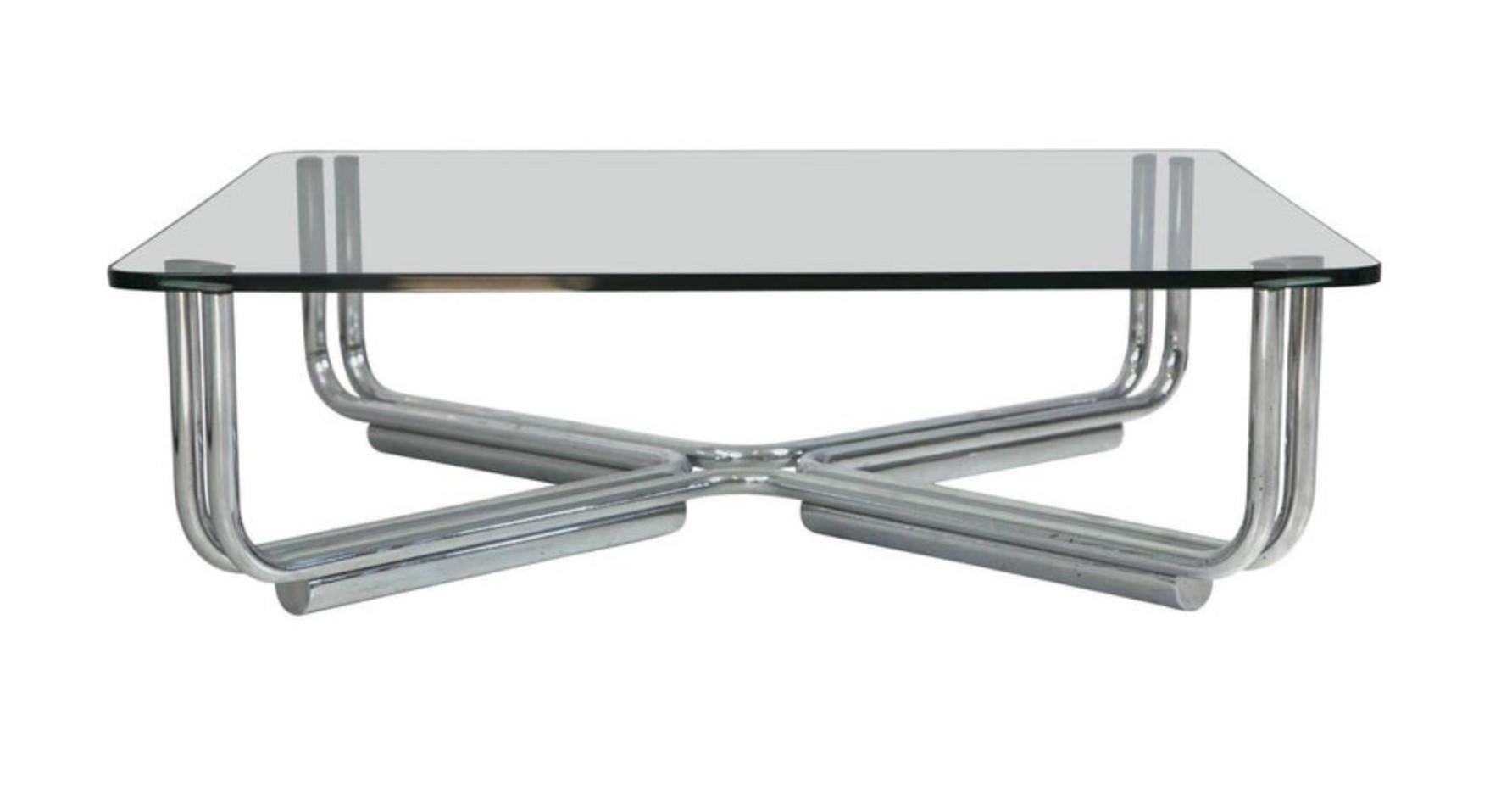 Elegant tubular chrome coffee table with original glass top. Model 784 Cassina. Designed by Gianfranco Frattini. Manufactured by Cassina. Low-slung, Mid-Century Italian Design, feels contemporary and eqasily fits in any bespoke home or office.