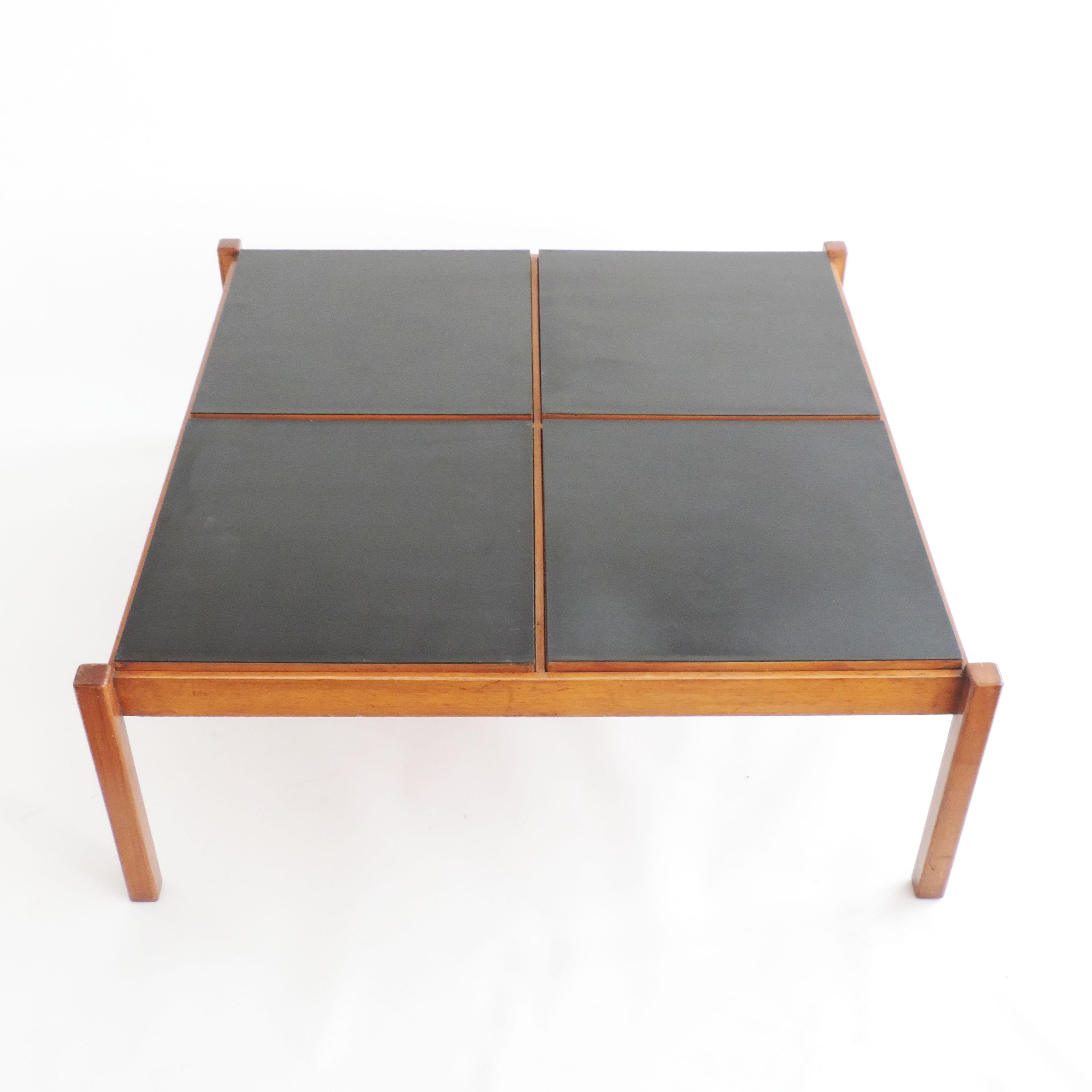 Rare variation by Architect Gianfranco Frattini coffee table for Cantieri Carugati, Italy, 1950s
Interchangeable squares in wood and black are movable as one wishes to create different effects.