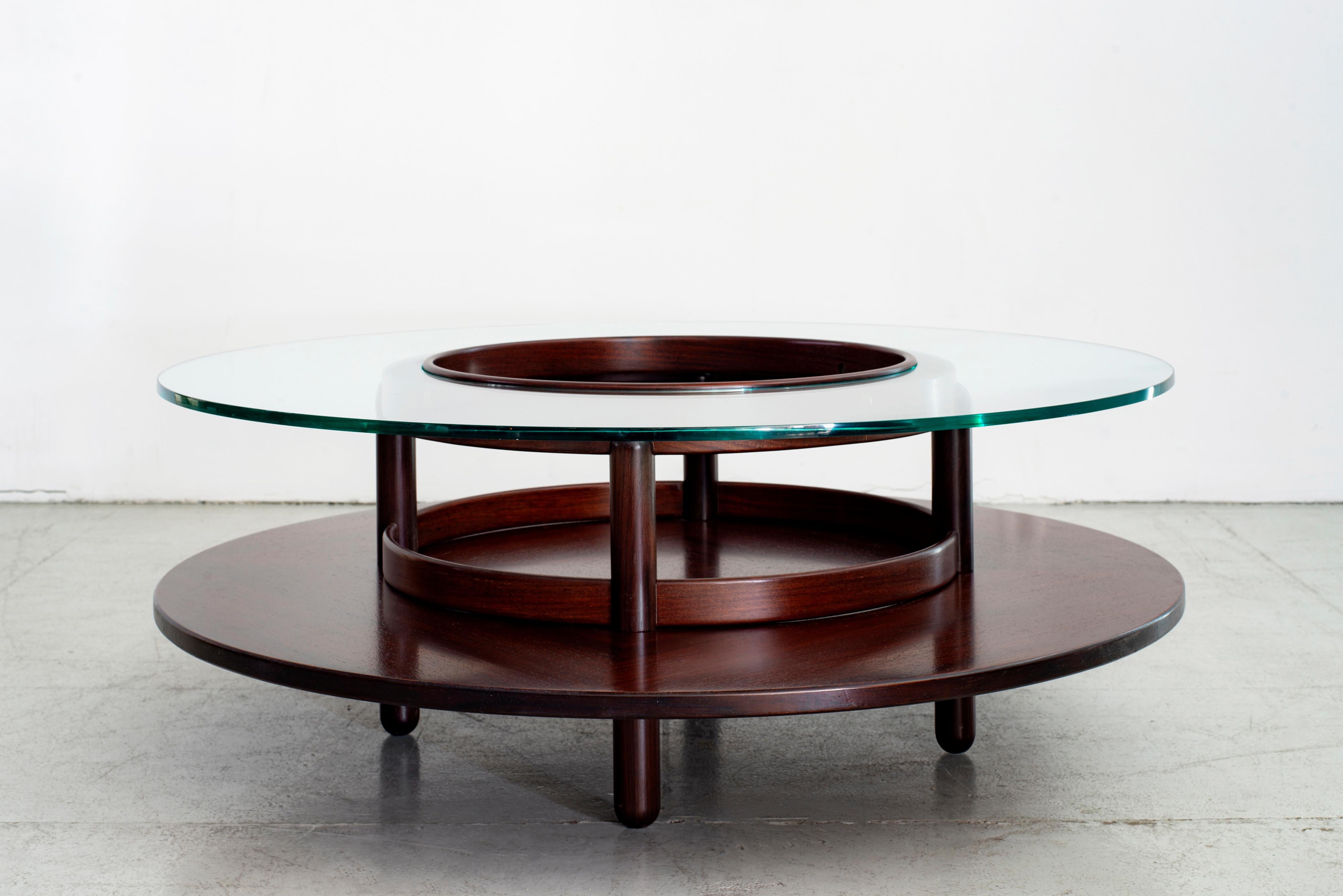 Exquisite Italian mahogany and floating glass table attributed to Gianfranco Frattini 
Coffee table
Cassina, circa 1960s. 

  